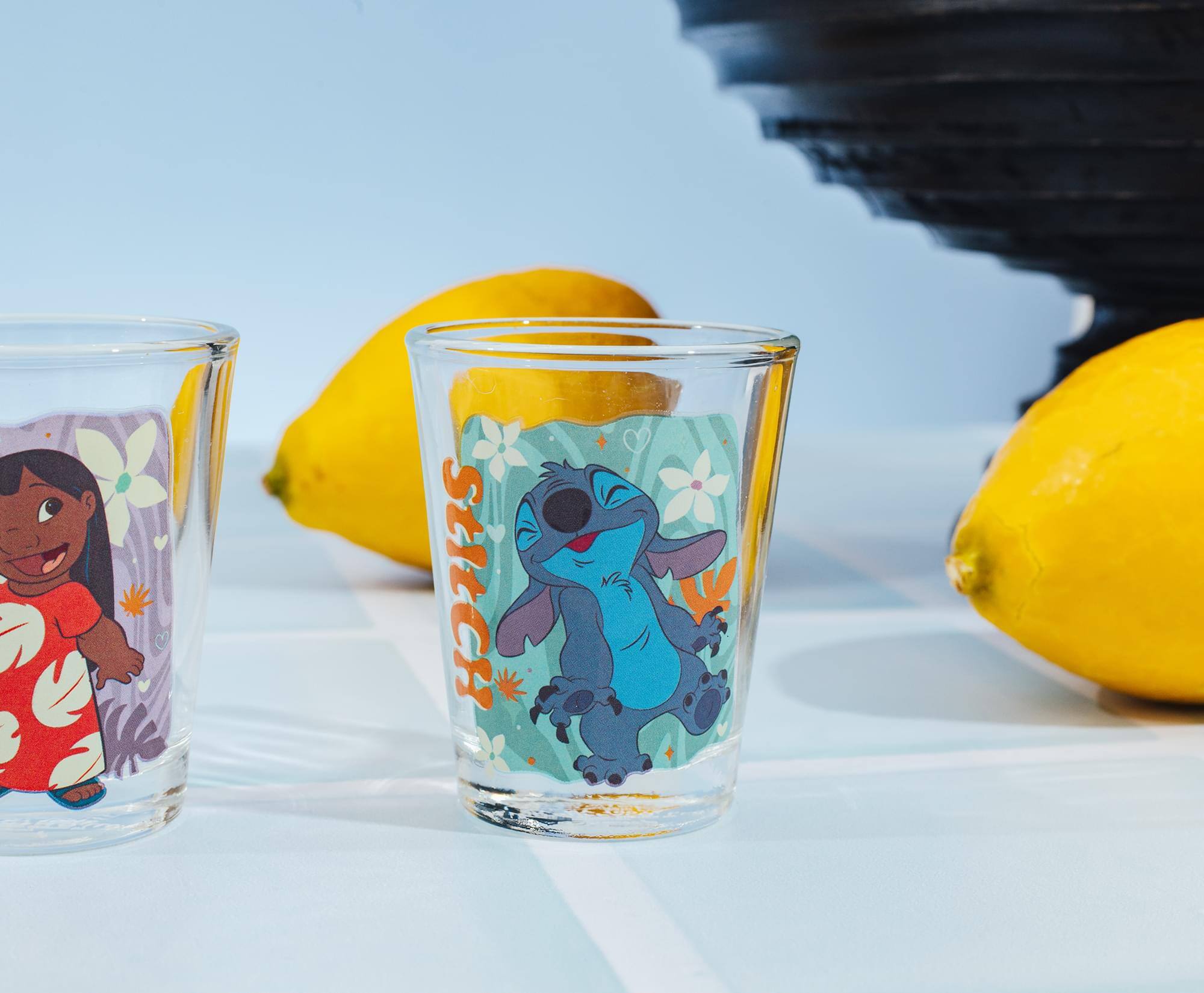 Alt View 5. Silver Buffalo - Disney Lilo & Stitch Tropical Characters 2-Ounce Mini Shot Glasses | Set of 4 - Multi-Colored.