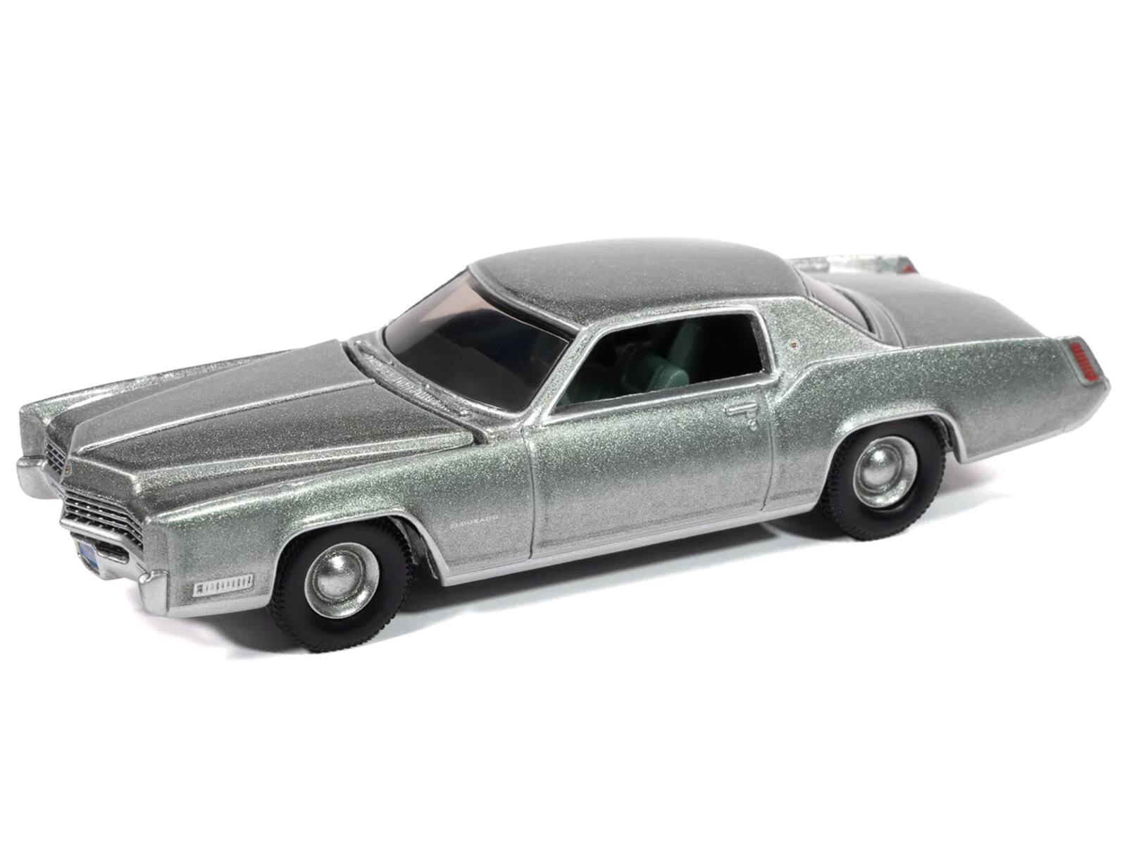 Angle. Autoworld - 1967 Cadillac Eldorado Crystal Firemist Metallic with Green Interior "Luxury Cruisers" Series 1/64 - Silver Green.