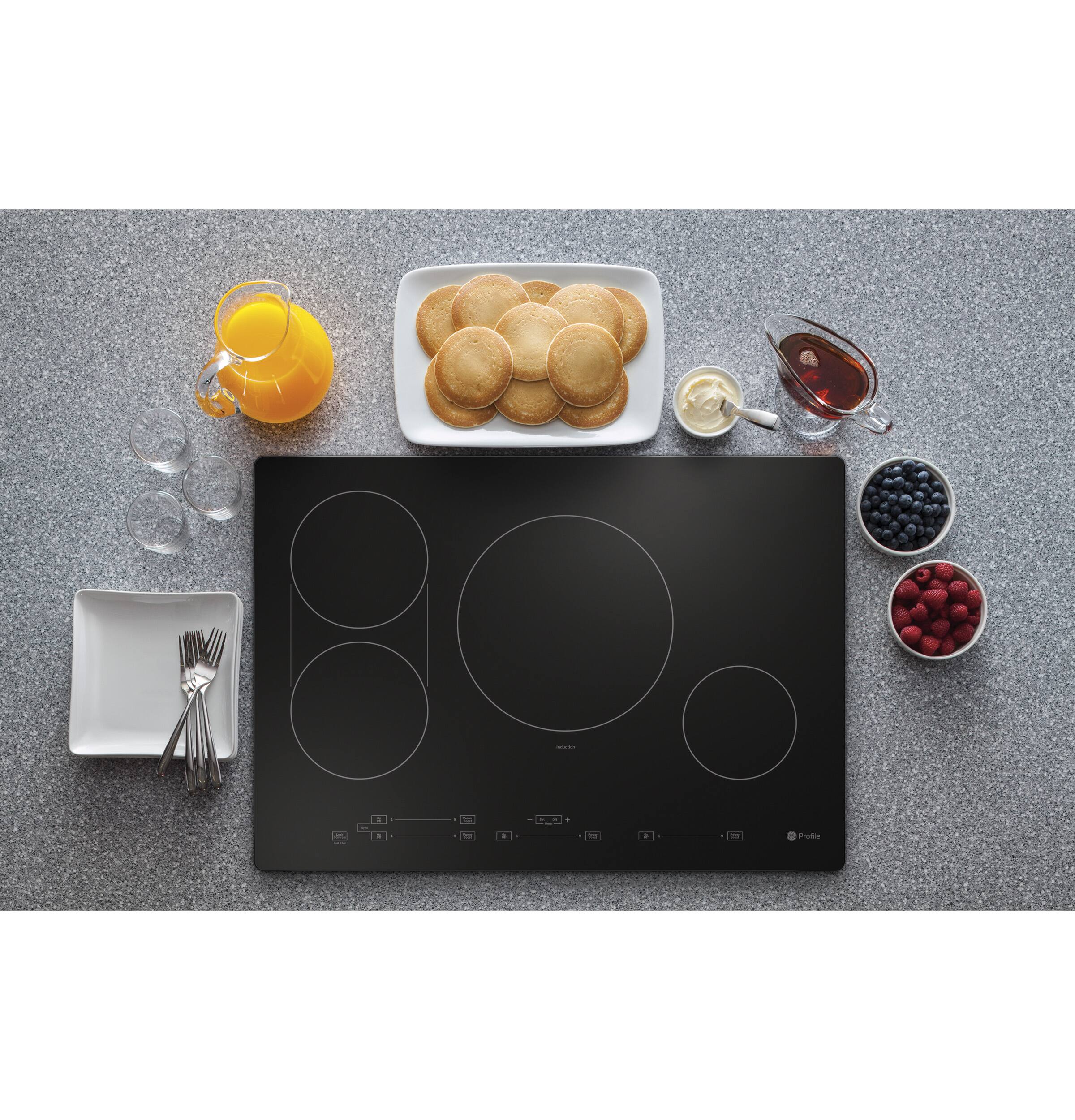 Alt View 14. GE Profile - 30" Built-In Electric Induction Cooktop with 4 Elements, Slide Touch Controls, and Power Boost - Black.