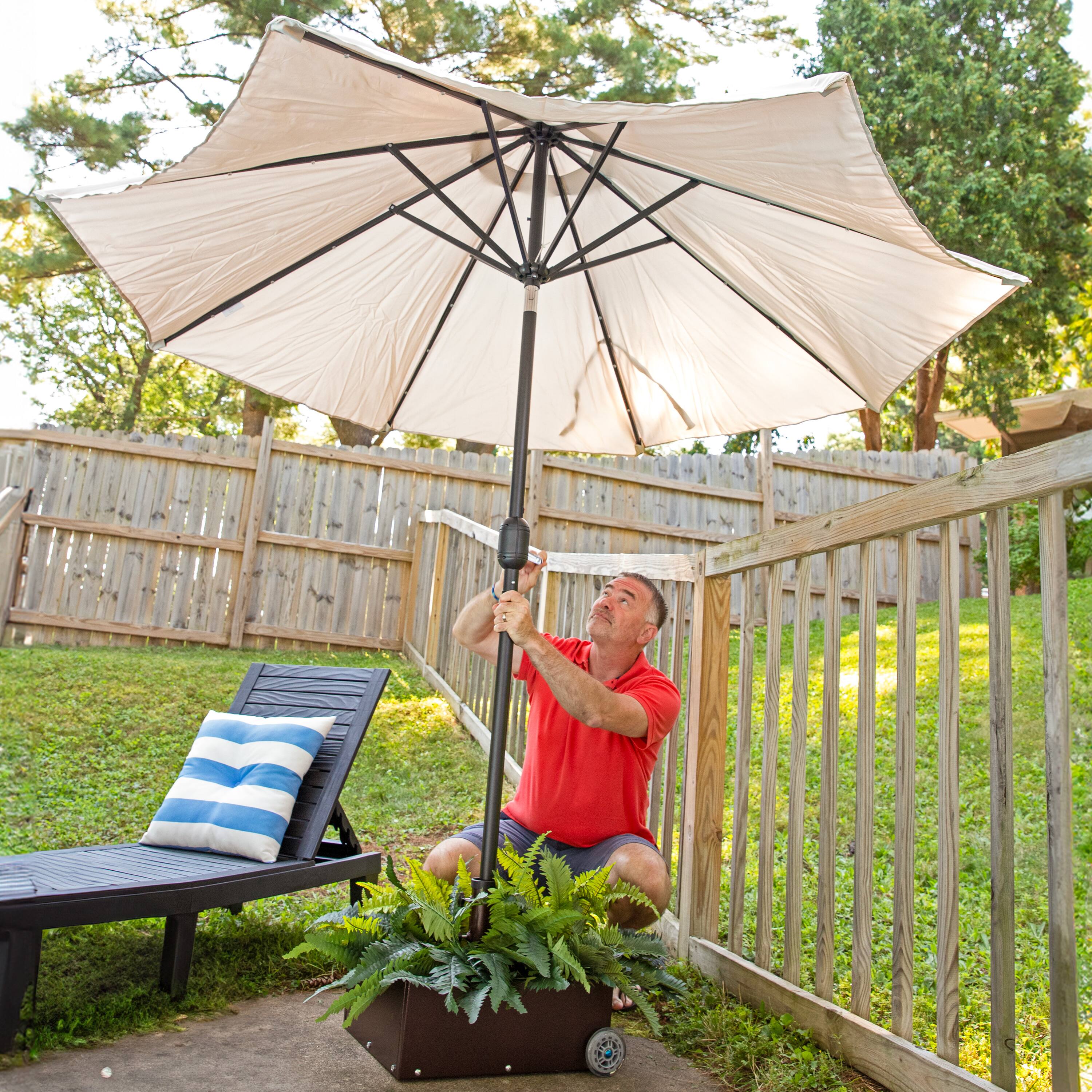 86 lbs. brown patio umbrella base with hidden wheels Amazon.com : Shademobile Heavy Duty Table Wheels, Bronze This Treasure Garden Base is made of cast iron and weighs 50lbs Best Choice Products Fillable Mobile