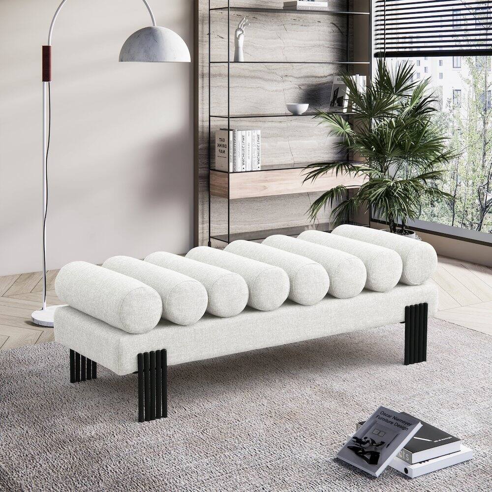 Sure, here is the corrected and grouped text from the image:

**On the shelf:**
- "Zaha Hadid"
- "Architecture"
- "Architecture"

**On the books on the floor:**
- "Casa Niemeyer"
- "Furniture Design"

**On the books on the shelf:**
- "Architecture"
- "Architecture"