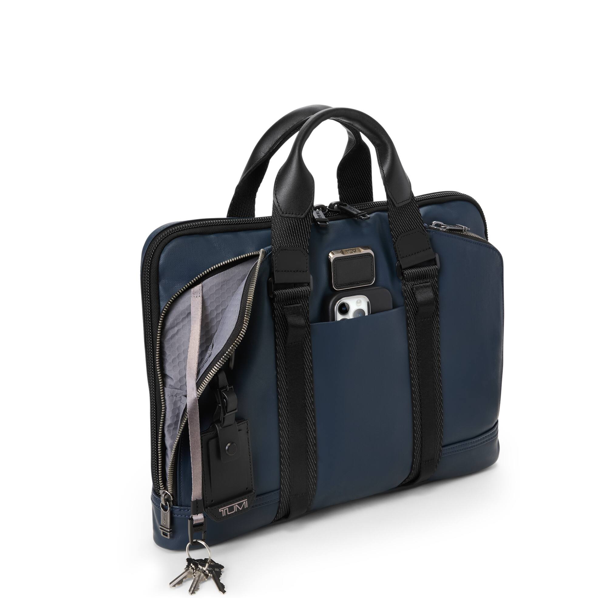 Left. TUMI - Alpha Bravo Academy Brief - Navy Coated Canvas.