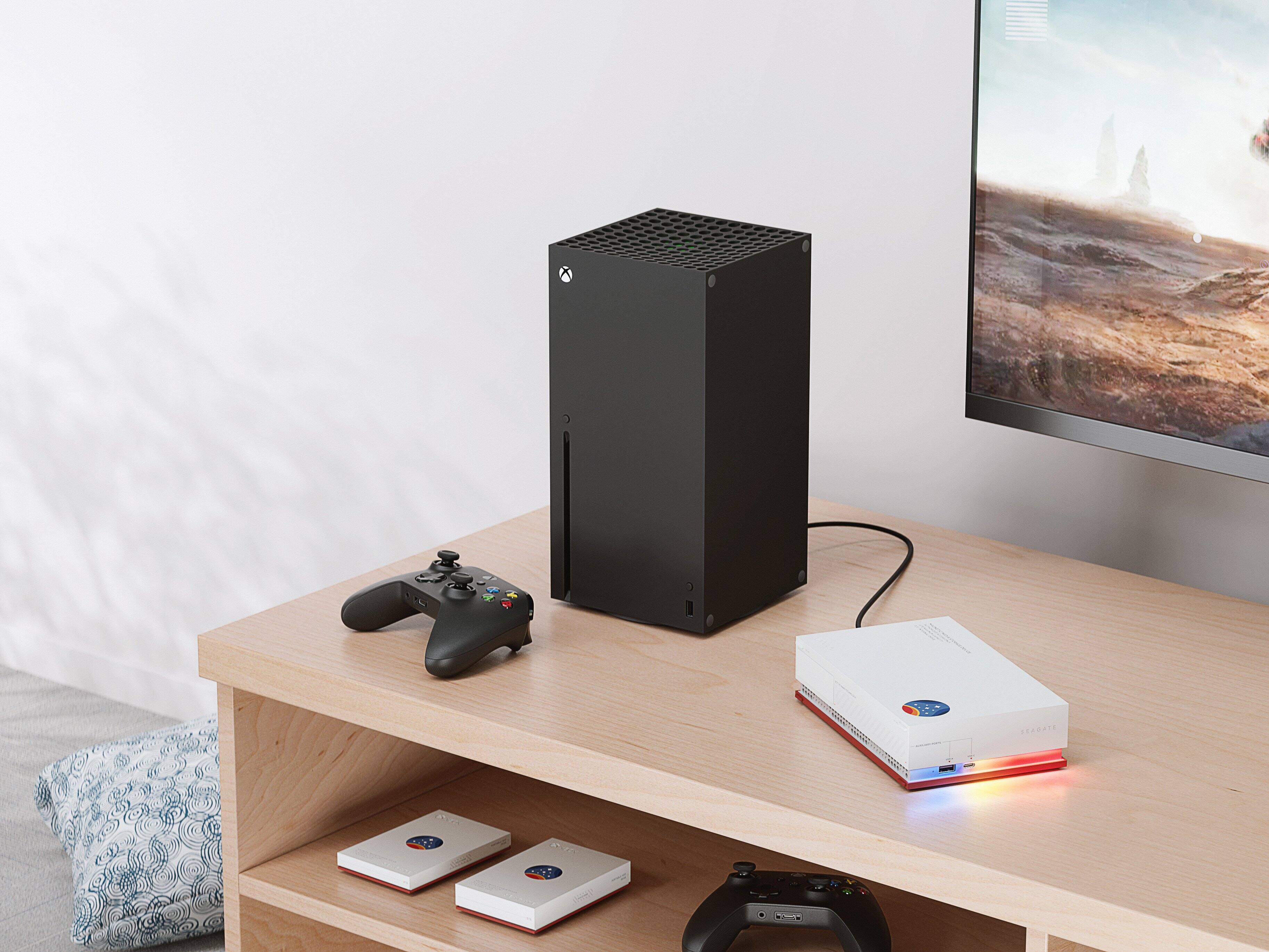 Left. Seagate - Starfield Special Edition Game Drive for Xbox 2TB External USB 3.2 Gen 1 Portable Hard Drive - White.