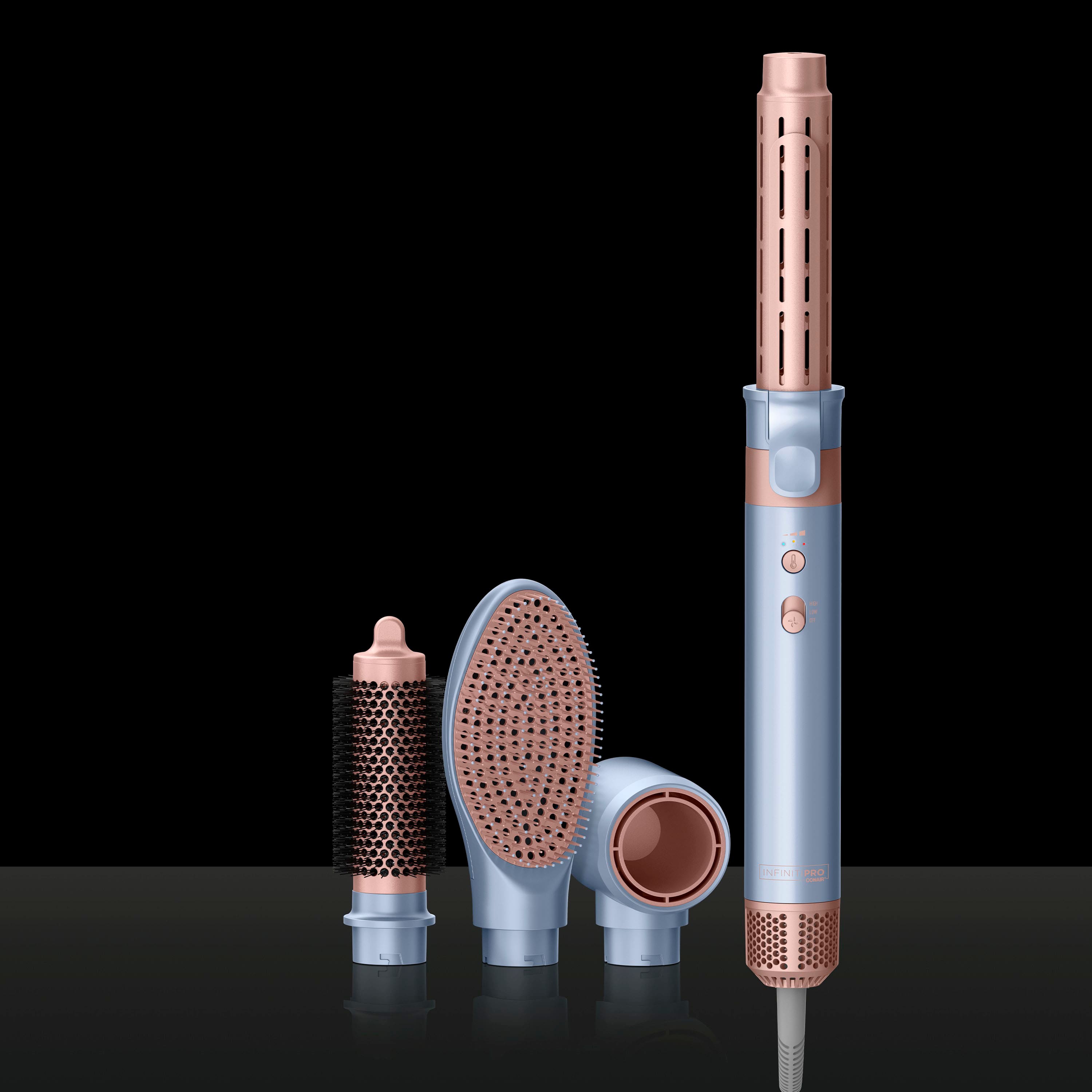 The text on the image reads "8 NF 20 PRO TP0N0." However, it is not clear what this text represents or its relevance to the image. The image features a hairdryer, a brush, and a hair dryer attachment, all placed on a black background.