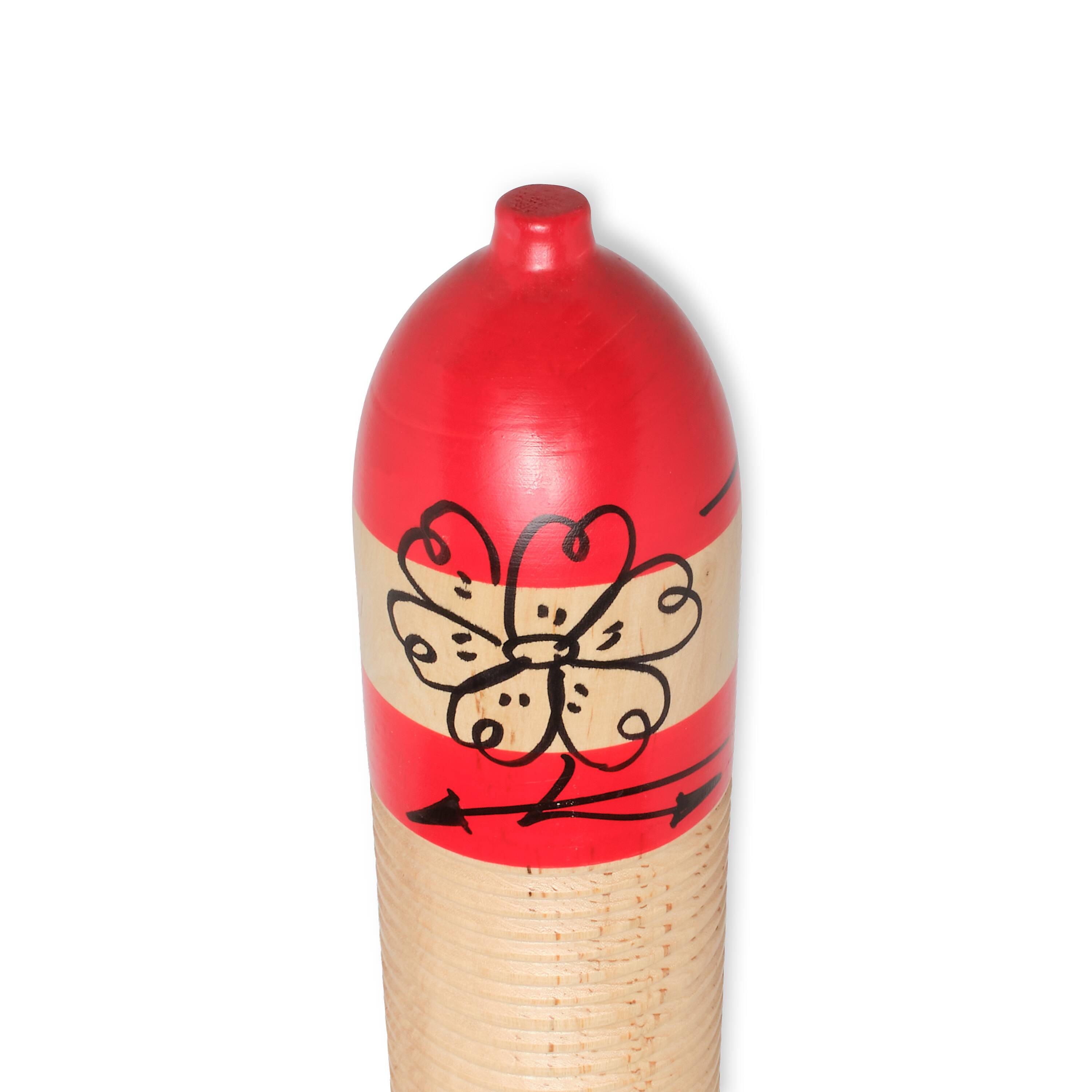 Left. Latin Percussion - Cylinder Guiro with Scraper.