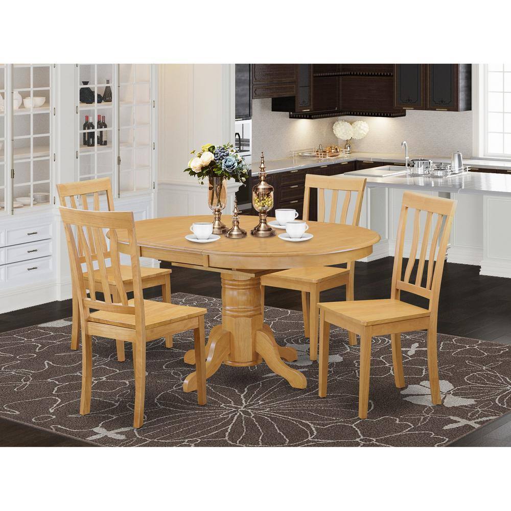 Back. East West Furniture - 5 Pc Dining room set-Oval dinette Table with Leaf and 4 Dining Chairs - Oak.