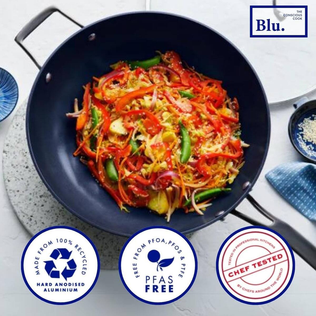 THE CONSCIOUS COOK  
Blu.  

MADE FROM 100% RECYCLED HARD ANODISED ALUMINIUM  
FREE FROM PFOA, PFOS & PTFE PFAS FREE  
TESTED IN PROFESSIONAL KITCHENS BY CHEFS AROUND THE WORLD