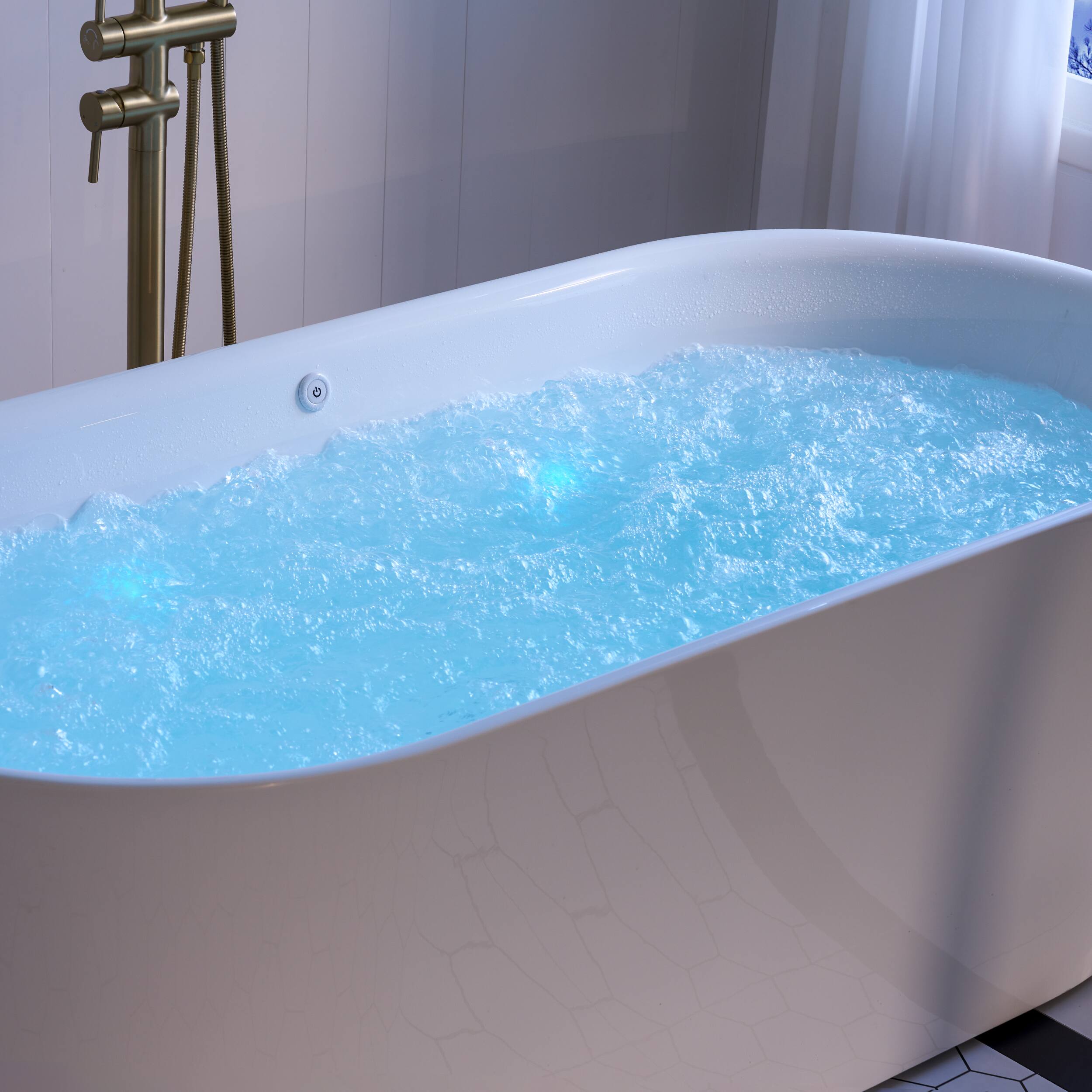 Angle. WELLFOR - Liora 67 in. x 31.5 in. Acrylic Oval Freestanding Flat Bottom Air Bubble Massage and LED Bathtub with Drain and Overflow - White.