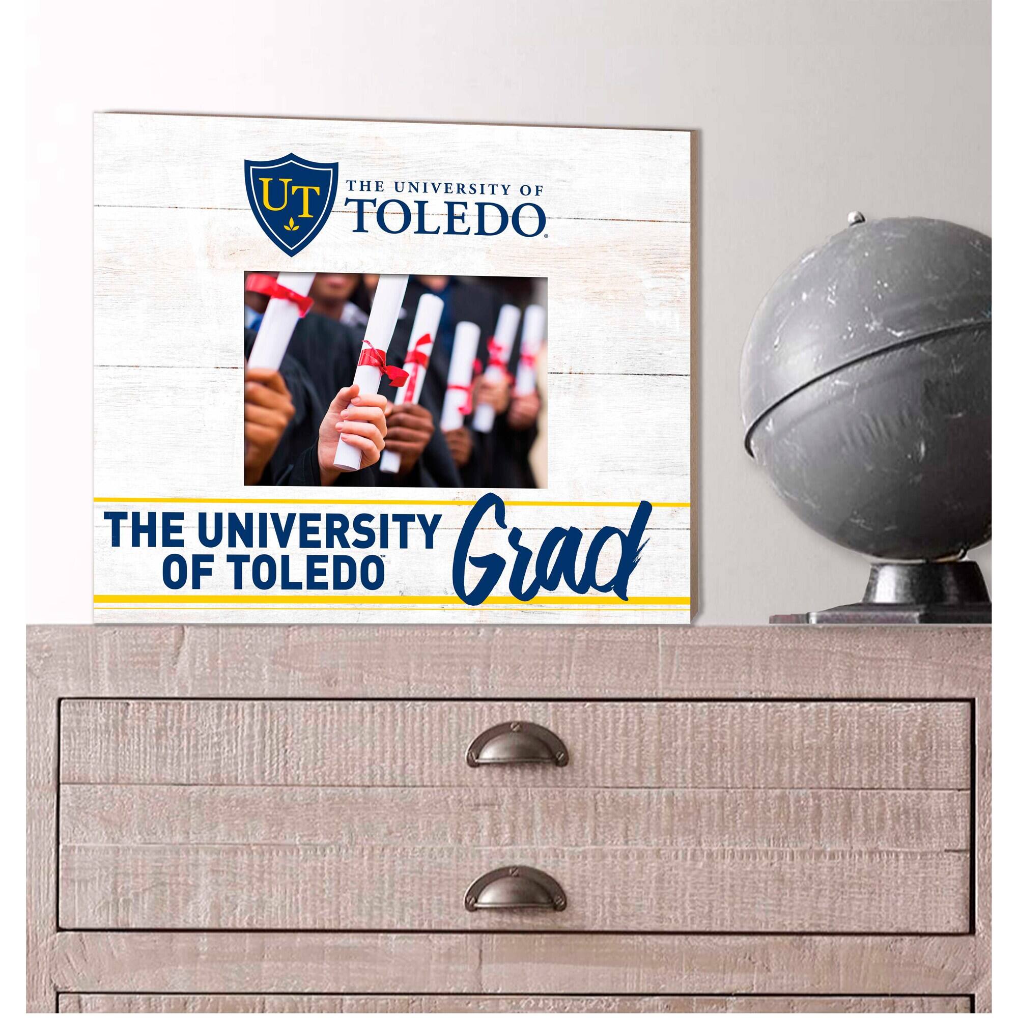 THE UNIVERSITY OF TOLEDO: THE UNIVERSITY OF TOLEDO Grad