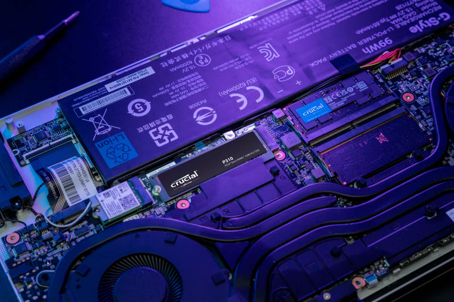 The text on the image reads:
"6200mAh 15.2V S P HAmooa 0199-104-Z-Z0- Min AZ () SOCD-LOVPN-00%LE Getac & P/N:541387460014 -G205 /2 (EU 460014 17AV W / 3 1 15 6200mAh) AZ - 6200mAh / -2 GAG-N4A 3 5 R43006 O SS Li-ion . 550 2200 P310 NvMe Gen PCH* 190991 US V184945A PN27703-UINR7-S11S MIFICA crucial LN Model 15.2V tsTyp.6514mAh GAG-N4A G-Style LI-POLYMER 66 BATTERY PACK DSC C Product crucial TN S A"
The text is a combination of various product details, including the battery capacity, voltage, and model number. It is likely that this information is related to a laptop or other electronic device.