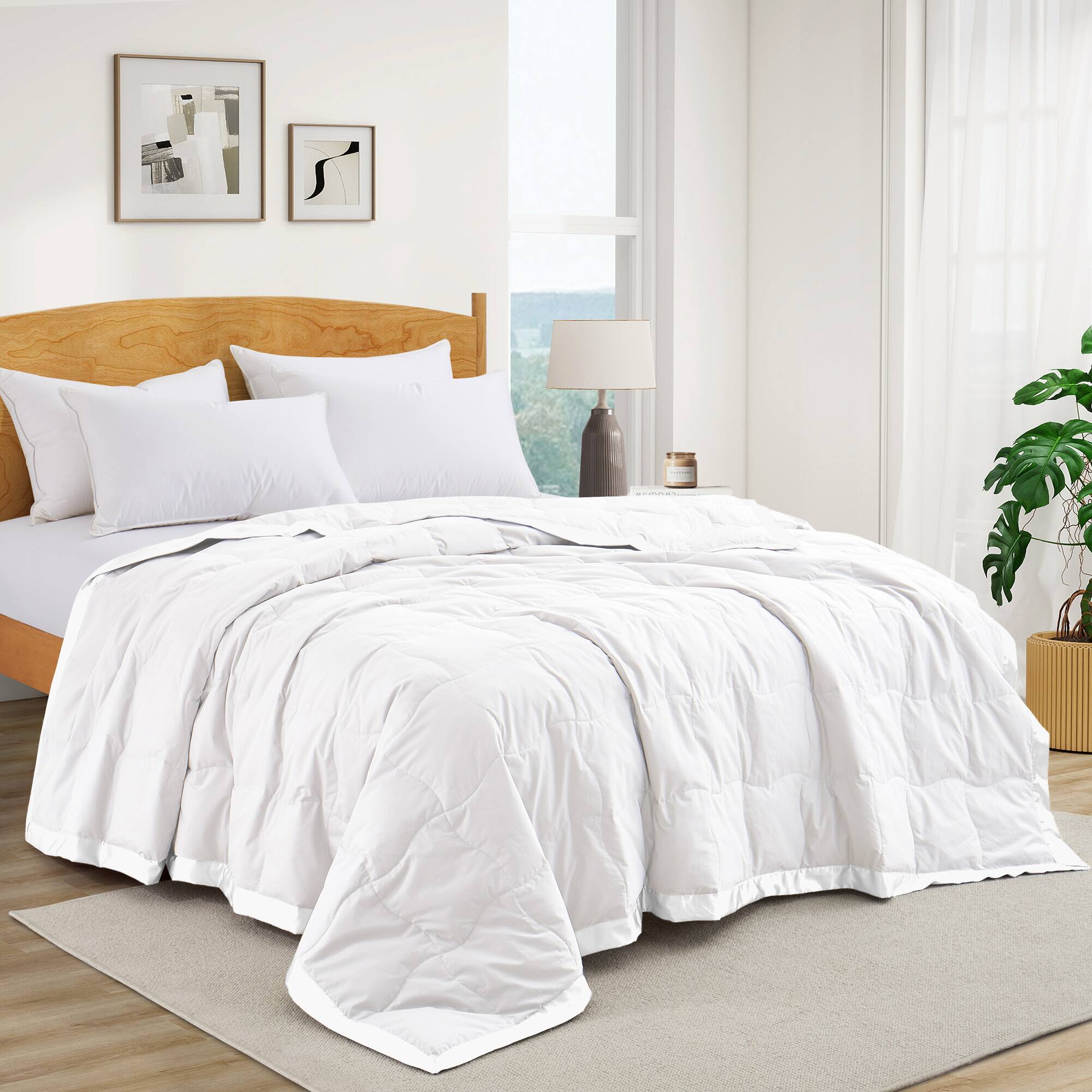 Angle. Peace Nest - Peace Nest Ultra-Lightweight Down Blanket with Satin Trim, White, 90x108 inches - White.