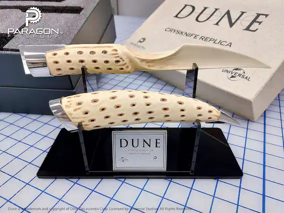 PARAGON™ FX GROUP
CRYSKNIFE DUNE PARAGON.
P REPLICA UNIVERSAL DUNE CRYSKNIFE REPLICA LIMITED EDITION OF 500
P UNIVERSAL UN HLUN
Dune is a trademark and copyright of Dino DeLaurentis Corp. Licensed by Universal Studios. All Rights Reserved.