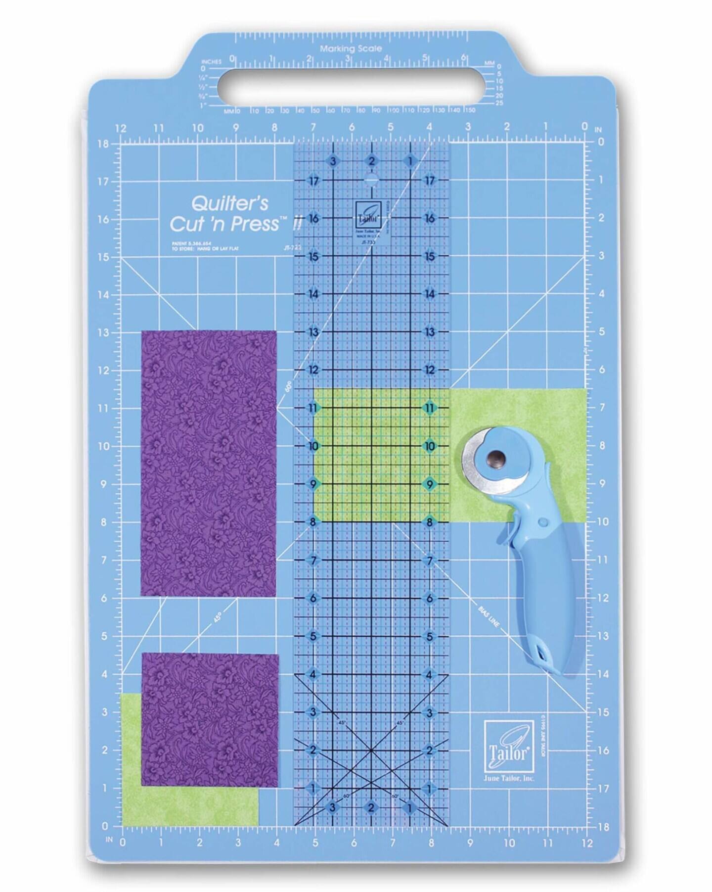 Marking Scale INCHES 0 1 2 3 4 5 6 7 8 9 10 11 12 13 14 15 16 17 18

Quilter's Cut 'n Press !!

Tailor

June Tailor, Inc.