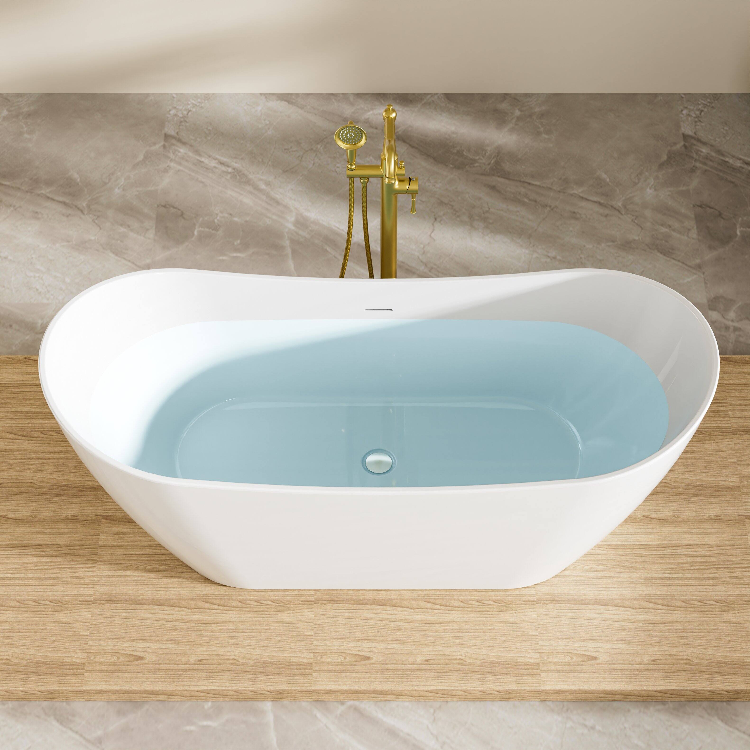 Left. WELLFOR - Vela 67 in. x 29 in. Acrylic Oval Freestanding Soaking Bathtub with Center Drain and Overflow - White.