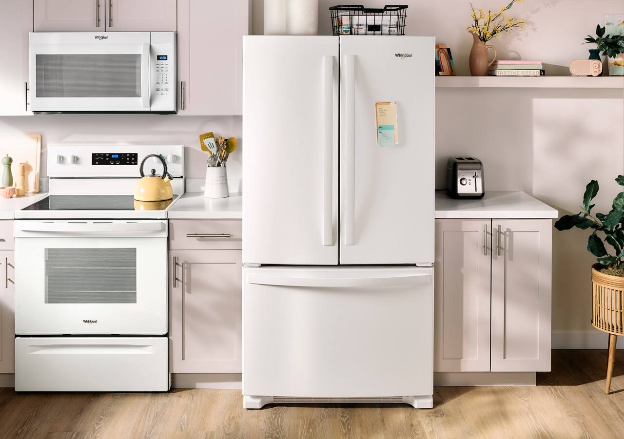 Whirlpool is the brand of appliances in this kitchen.