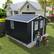 Left. Mondawe - 8x8 FT Outdoor Storage Shed with Protective Film, Four Daylight Windows and Lockable Doors - Dark Gray.