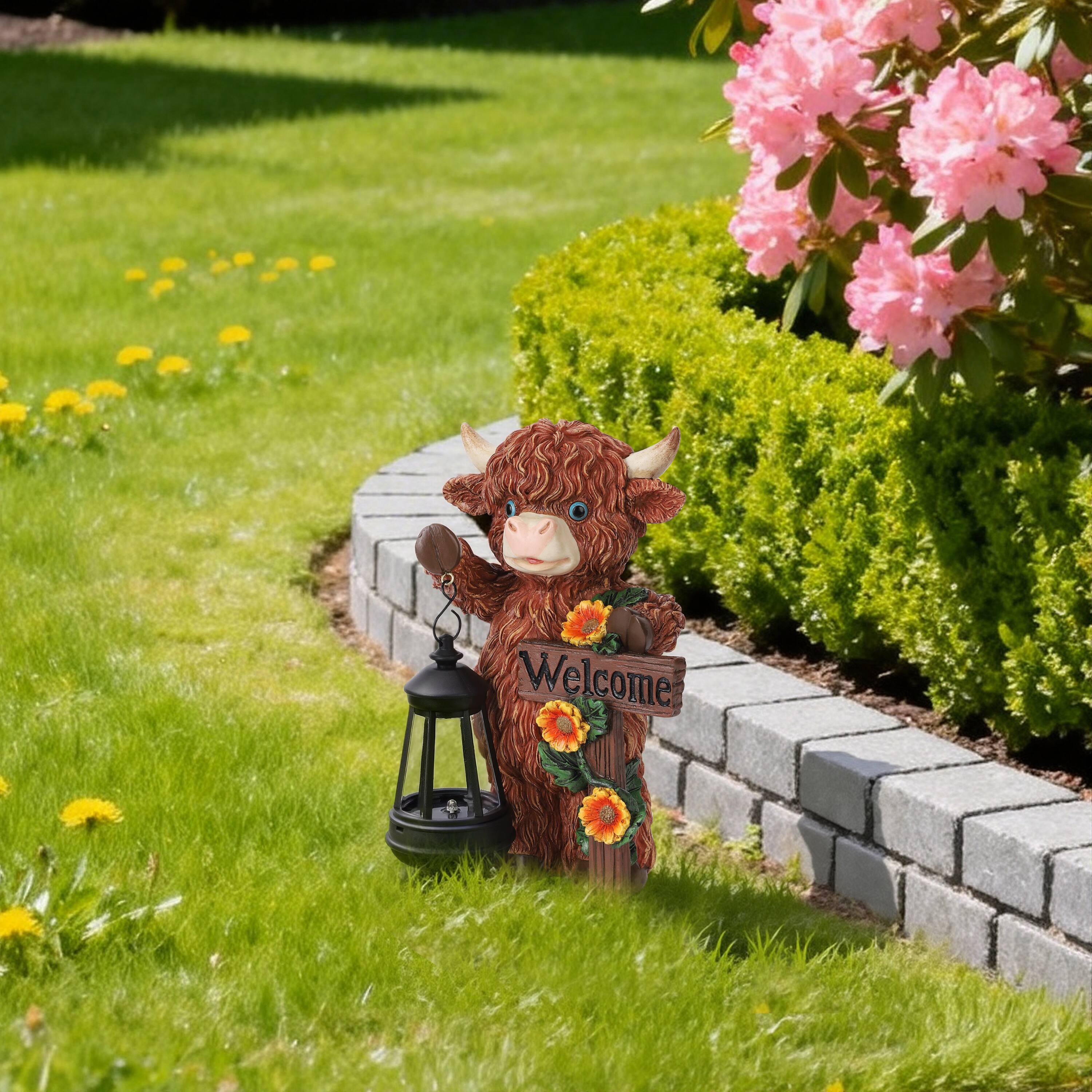 Angle. Techko - Sunny Moo Outdoor Solar Cow Garden Statue with Integrated LED Lantern.