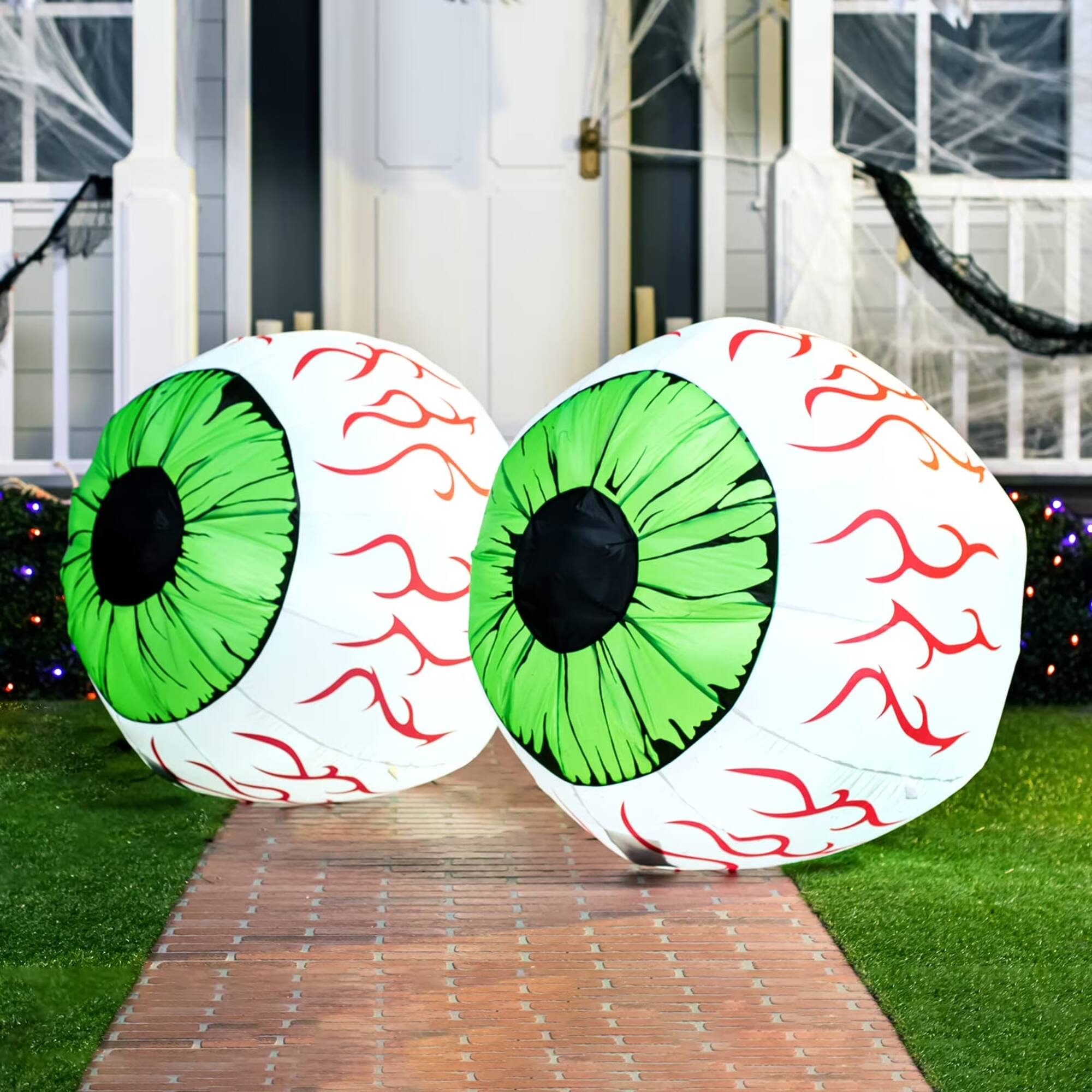 Left. Joyfy - 2 Pack Halloween Inflatable Eyes Decoration with Build-in LED, 3ft Blow Ups Green Eyes for Yard, Halloween Decor Outdoor - white.