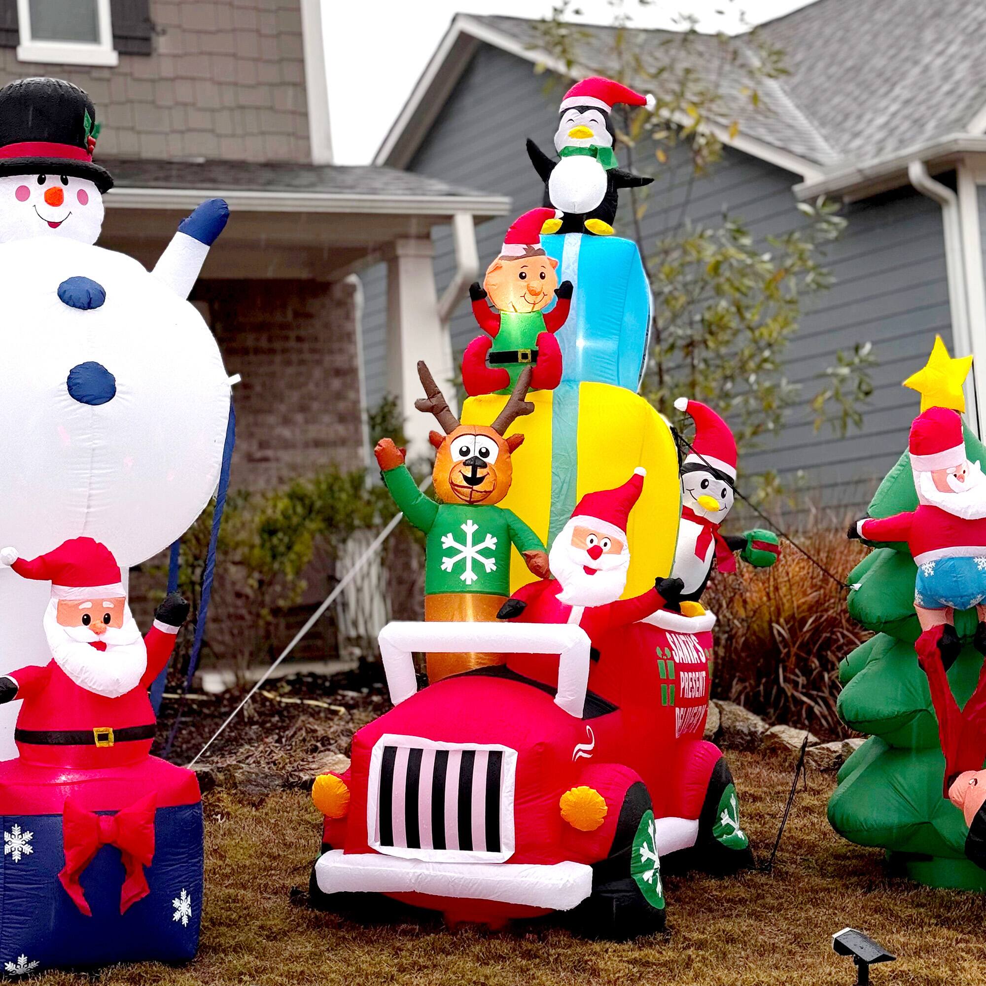 Alt View 7. Outsunny - 9ft Inflatable Santa Driving Gift Car with Elk & Penguins, Outdoor Blow-Up LED Yard Decor - Red.