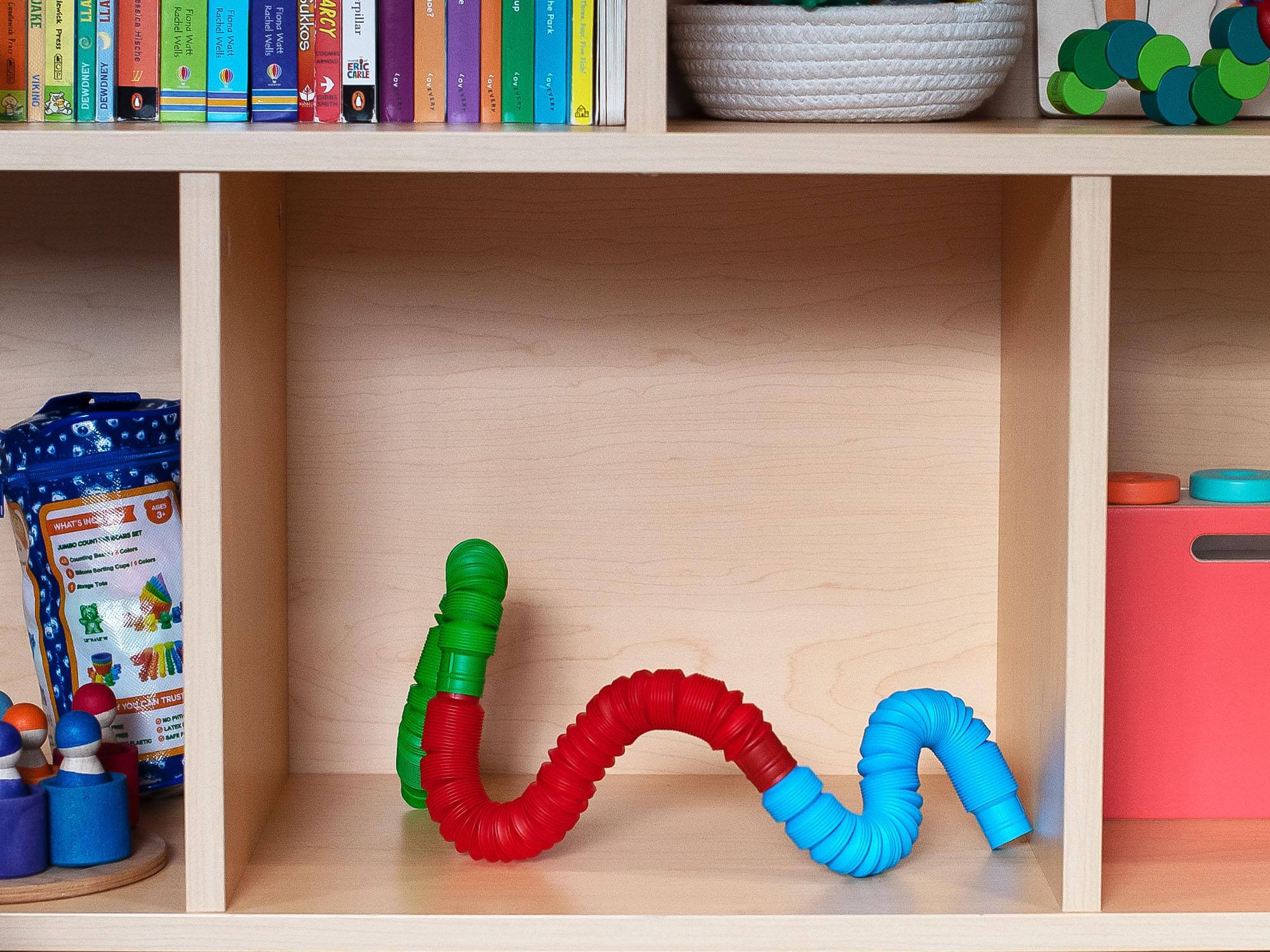 Sure, here is the corrected and grouped text from the image:

---

**Top Shelf:**

- JAKE VIKING
- Imiak FIA
- LLA LLA DEWDRKY DEWDNEY
- Edra Hische
- V Eache
- Fiona HPM
- +-M Rache
- Fiona 1HM
- Pealt Rachel
- Fiona KM
- MOM Sukkos
- ARCY rpillar
- lar ealc
- CREL Too
- .TERT E de E Park
- A 3. WHAT 3
- ICM ARS i CaL
- - - - -o YOUCAN EURT
- a LAMERT i ArE

**Books:**

- JAMBOO
- JAMBOO
- JAMBOO
- JAMBOO
- JAMBOO
- JAMBOO
- JAMBOO
- JAMBOO
- JAMBOO
- JAMBOO
- JAMBOO
- JAMBOO
- JAMBOO
- JAMBOO
- JAMBOO
- JAMBOO
- J