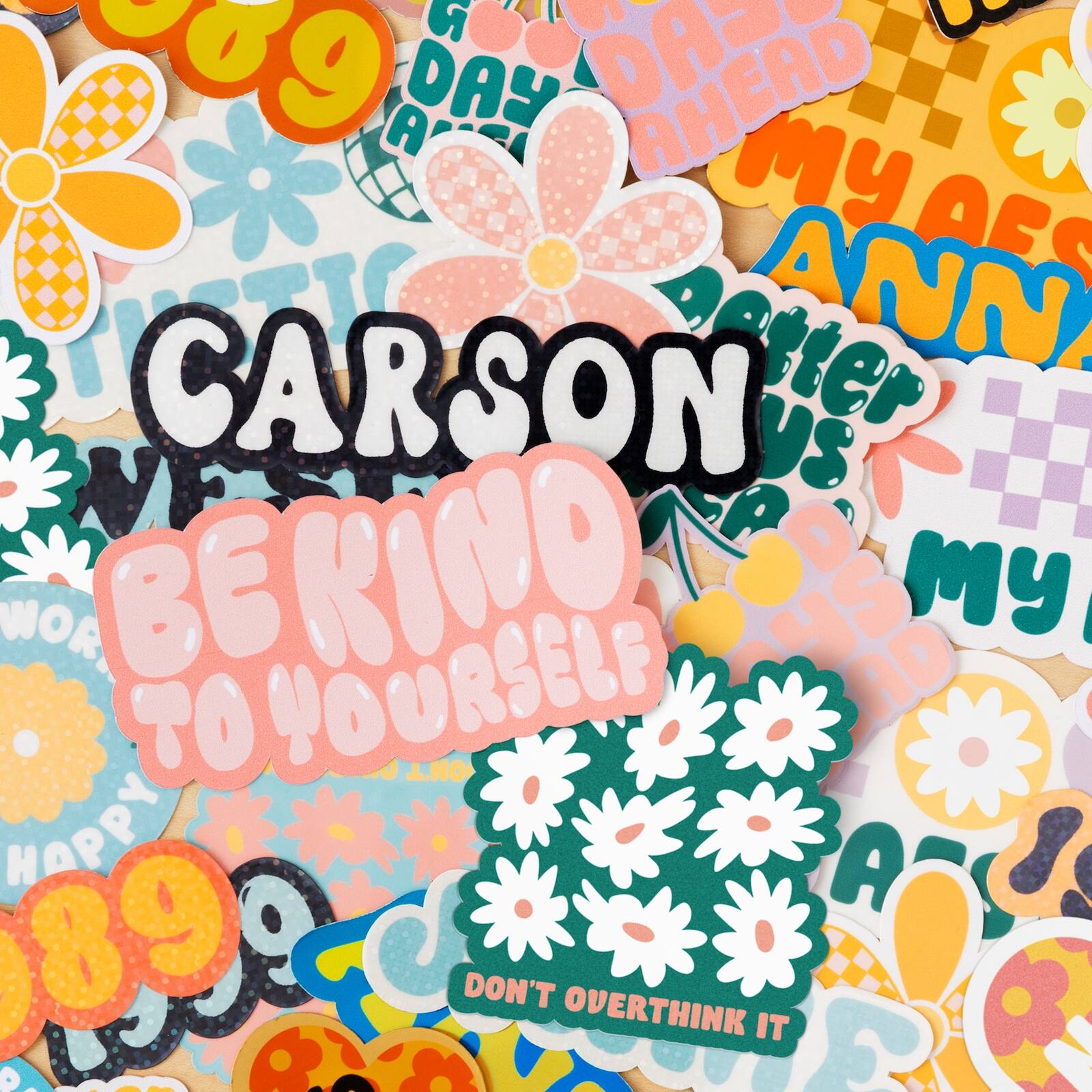 569 G C AX A DAY AHEAD  
My AES JORI  
Better ANN CARSON  
My AES JORI  
BE KIND TO YOURSELF  
DON'T OVERTHINK IT