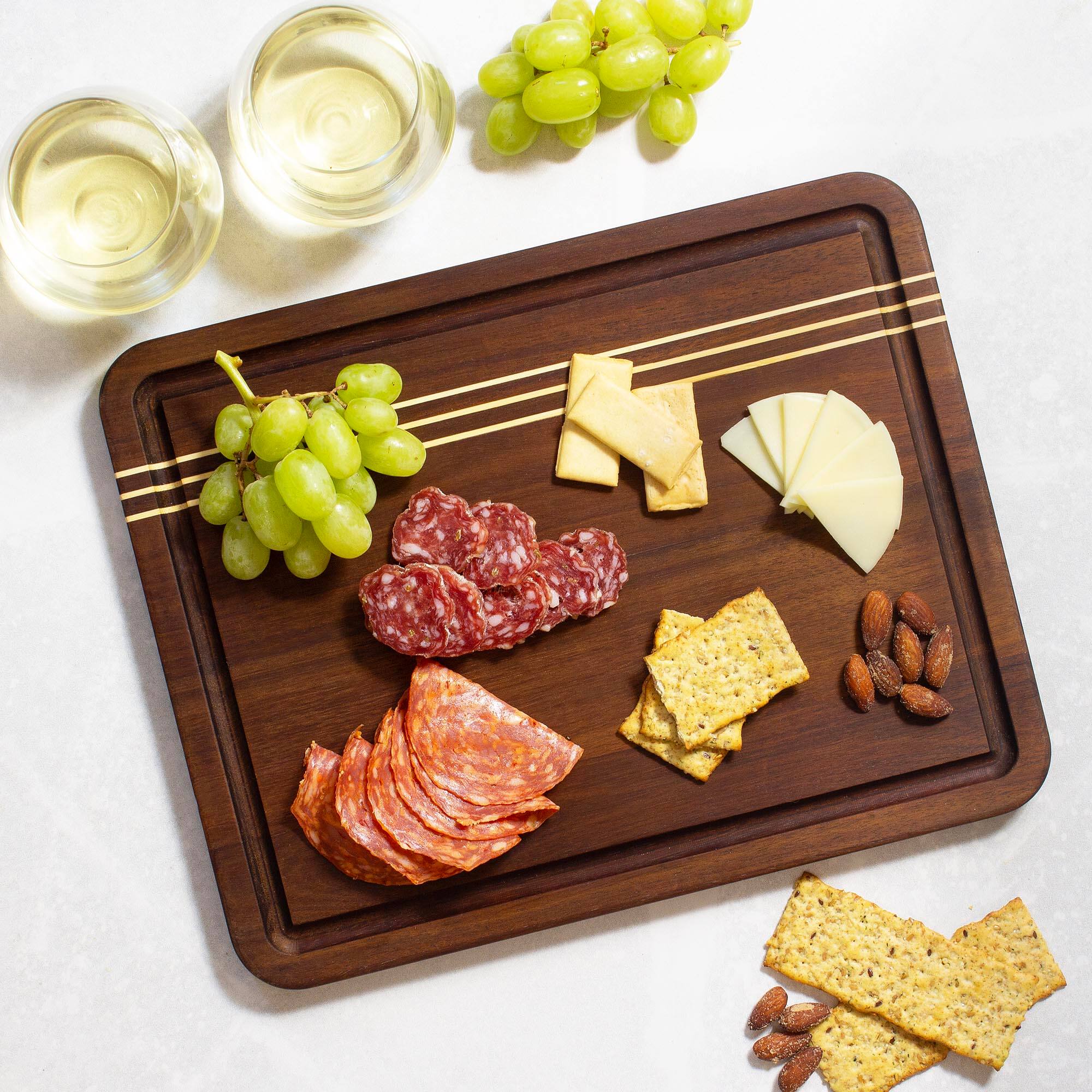 Left. Rock & Branch - Acacia Wood Pinstripe Cutting Board, 14" x 11".