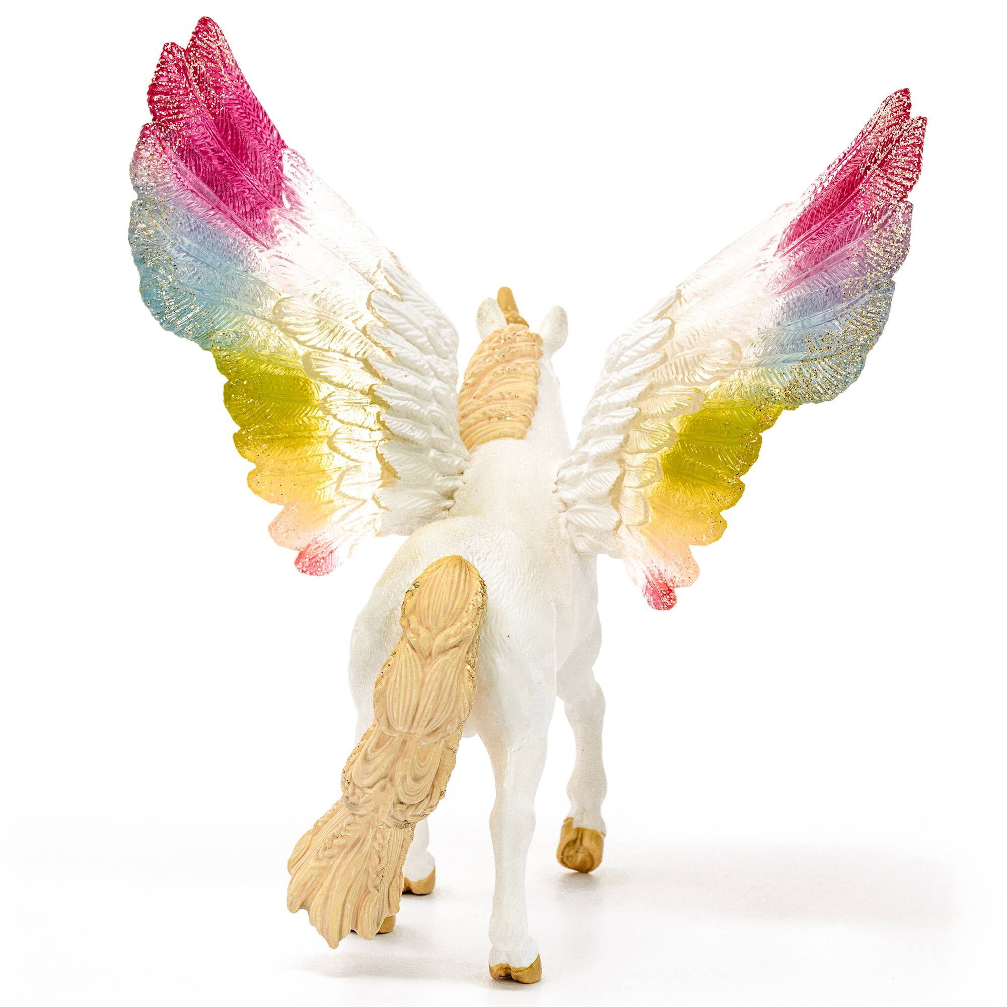 Left. Schleich - Bayala: Winged Rainbow Unicorn.