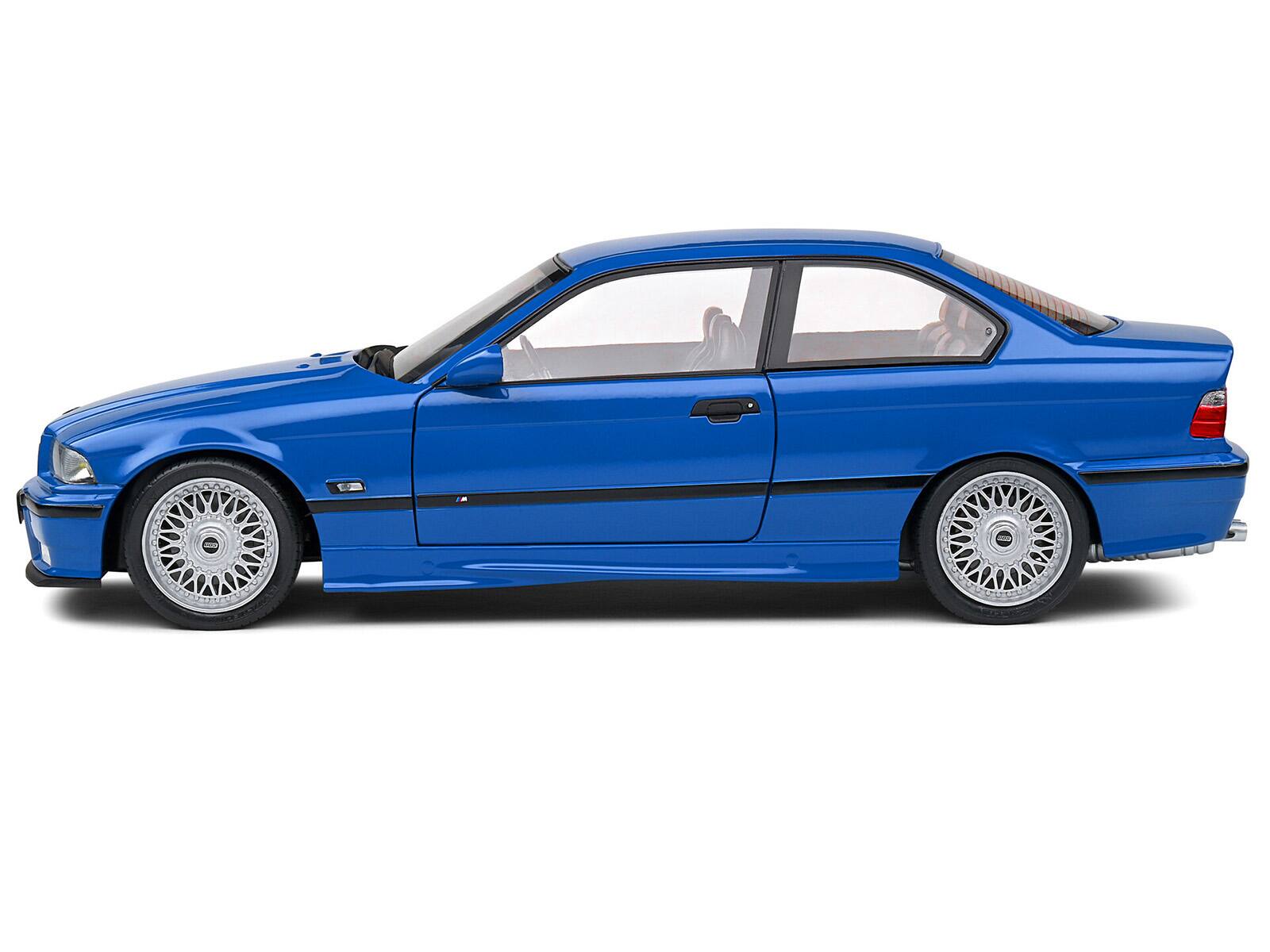 Left. Solido - 1996 BMW E36 M3 Coupe Santorin Blue 1/18 Diecast Model Car by Solido - Blue.