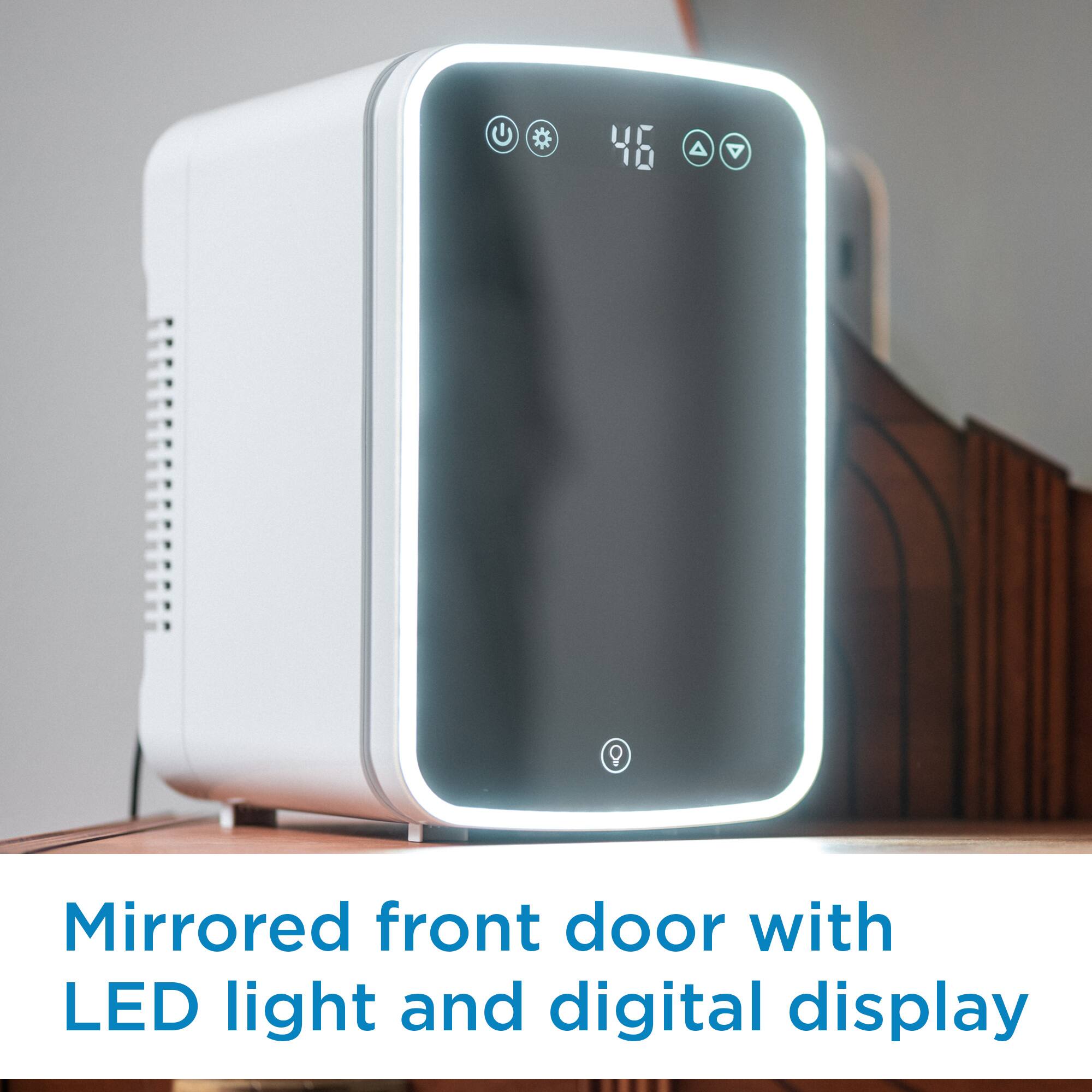 Mirrored front door with LED light and digital display.