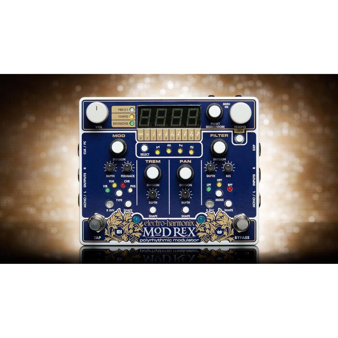 I PESHT MIDI IN TEMPO FC CLK VOL DIVISIONS MOD DIVISION OF - 1 + - : 1 4 A SELECT TREM 1 J 3 F N u PAN PRESET SELECT/STORE TEMPO LOCK J FILTER : DIVISION EXP - OUTPUTS - MONO - DEPTH FEEDBACK DEPTH RES FUN CHE DIVISION DIVISION LPF HPF EPF INPUTS VI PG - TYPE HODE DEPTH DEPTH ONOW E IV SHAPE E UNY AH SHAPE SHAPE electro-harmonix MOD REX TAP BYPASS polyrhythmic modulator bojwic modulator