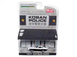 1971 Datsun 240Z Police Koban, Japan Limited Edition to 4,600 pieces Worldwide 1/64 Diecast Model Car by Greenlight - Black And White