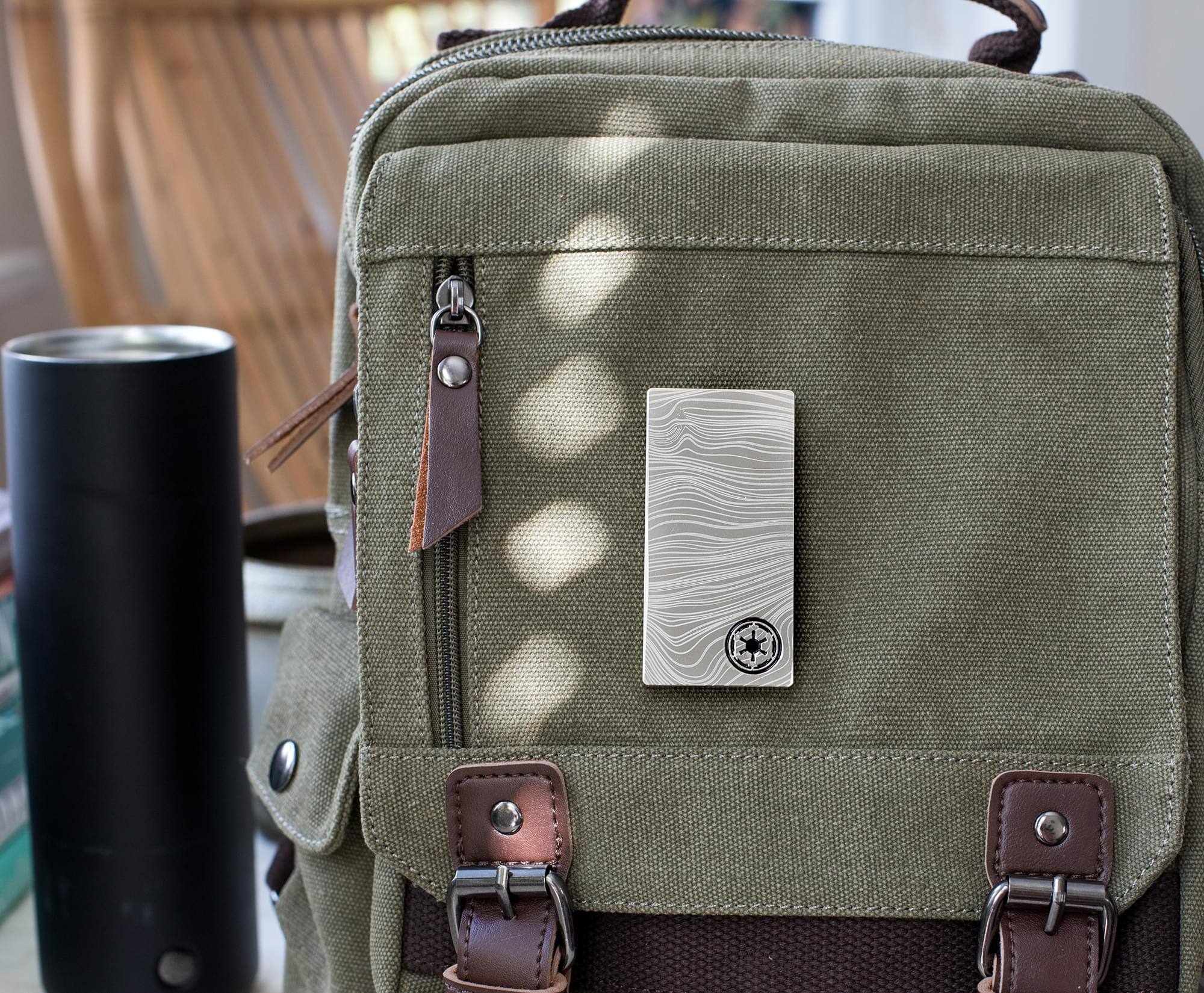 Alt View 4. SalesOne LLC - Star Wars: The Mandalorian Beskar Credit 3-Inch Magnetic Replica Pin - Silver.