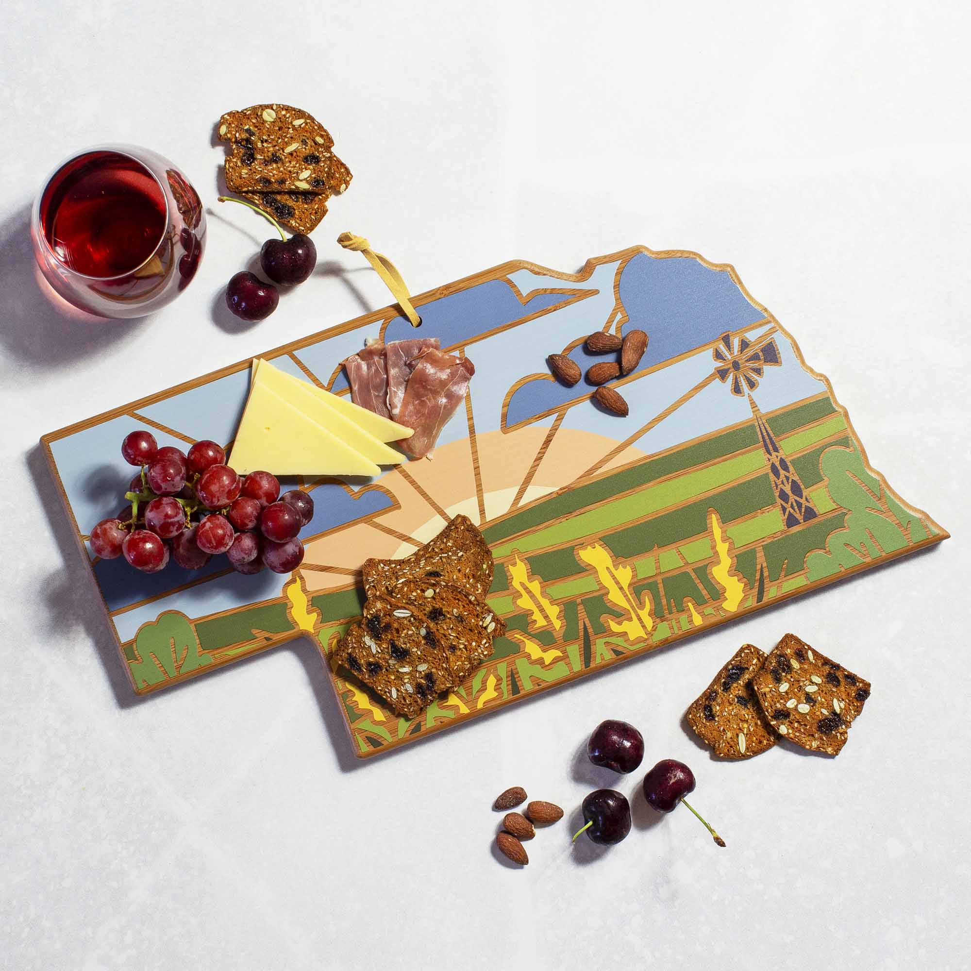 Angle. Totally Bamboo - Nebraska Cutting Board with Artwork by Summer Stokes.