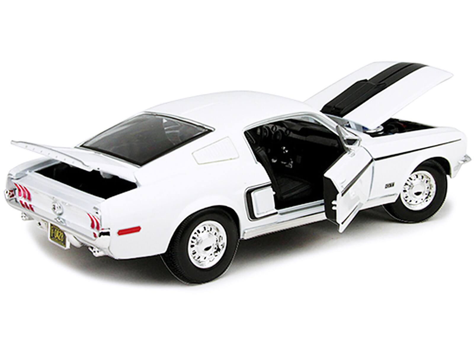 Left. Maisto - 1968 Ford Mustang CJ Cobra Jet White 1/18 Diecast Model Car by Maisto - White.