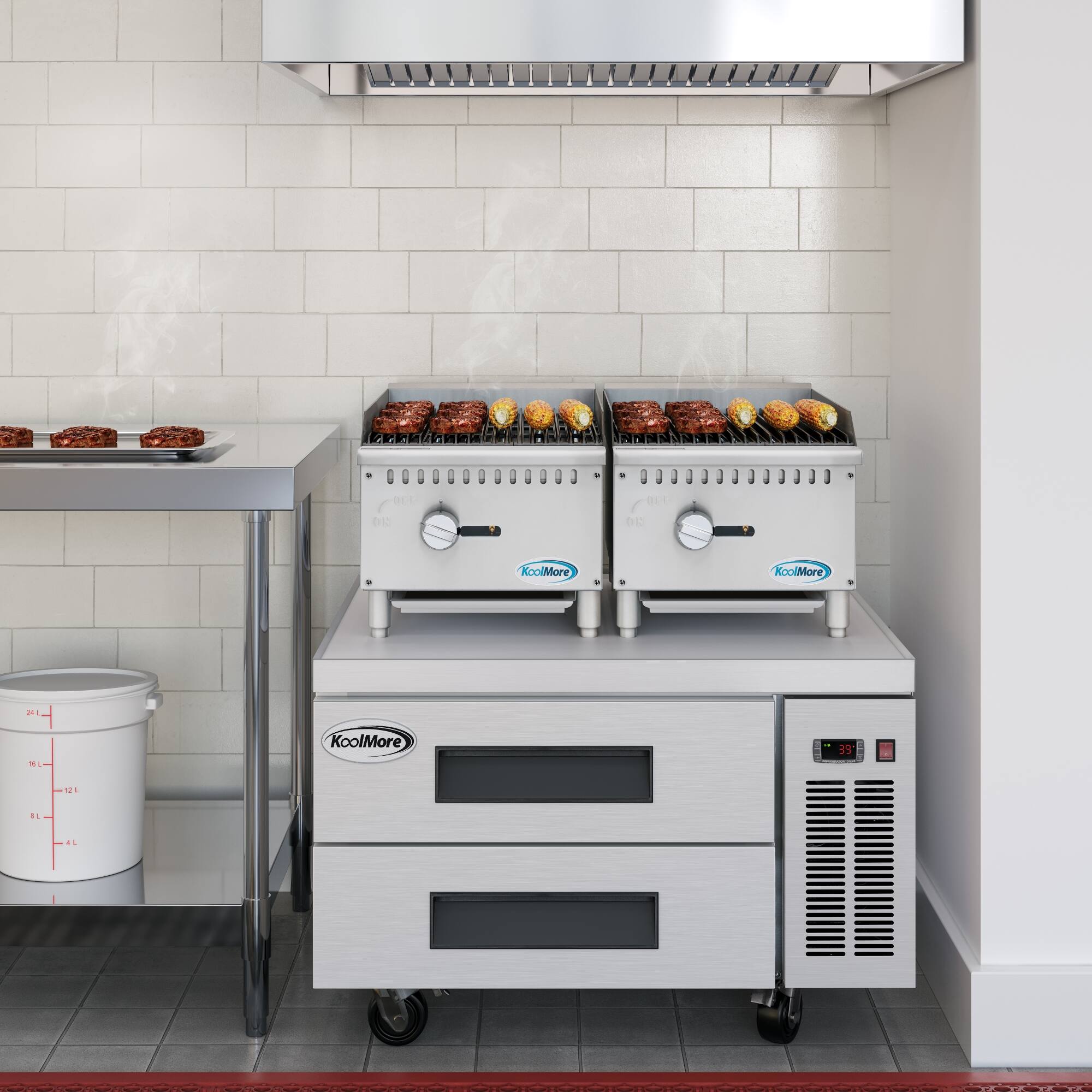 The image shows a kitchen with two KoolMore ovens on a counter. These ovens are designed for cooking food, and they are placed next to each other. The kitchen also features a stove and a sink, making it a well-equipped space for preparing meals.