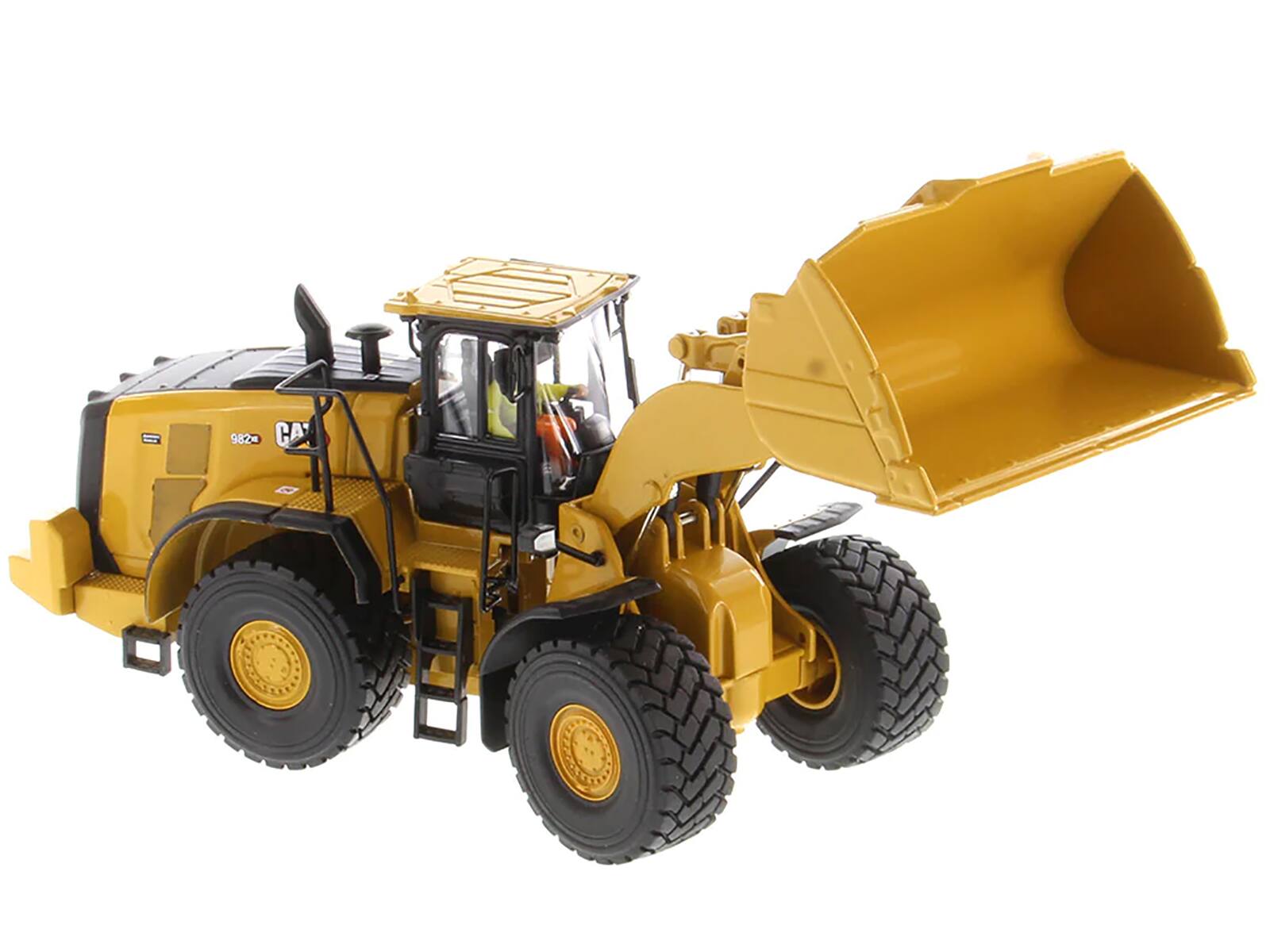 Left. Diecast Masters - CAT Caterpillar 982 XE Wheel Loader Yellow with Operator "High Line Series" 1/50 Diecast Model by Diecast Masters - Yellow .