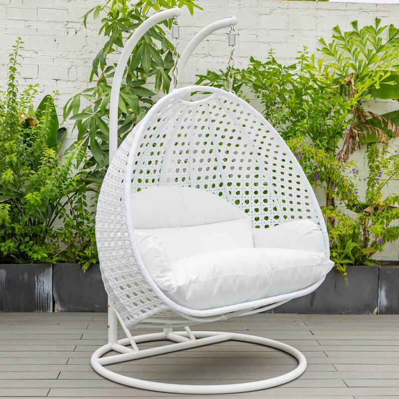 Left. LeisureMod - Leisuremod Modern 2-Person Outdoor Egg Swing White Wicker Chair with Stand, Plush Washable Cushions & Waterproof Cover - White.