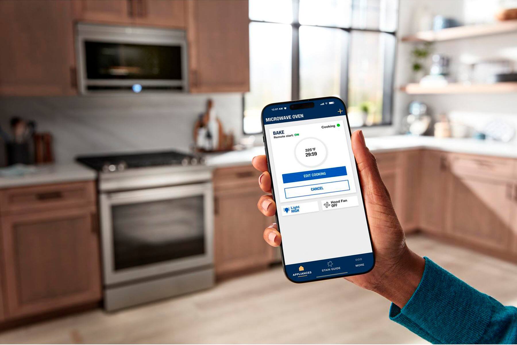S2.07 AM MICROWAVE OVEN BAKE OVEN Remote start: - . + Cooking 325F 29:59 EDIT COOKING CANCEL Light MIGA Hood Fan OFF APPLIANCES STAY GUARDED a/D0 MORE