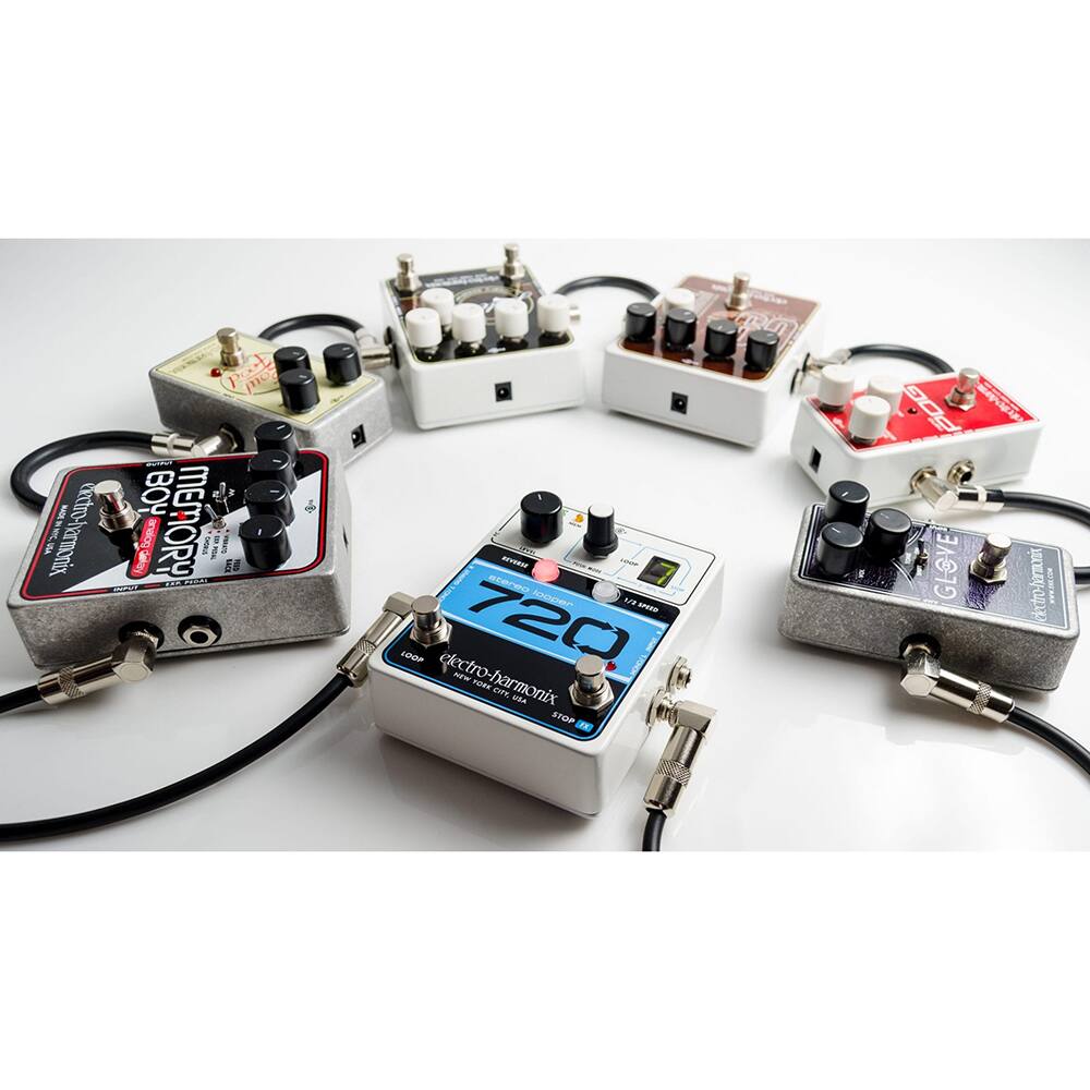 Sure, here is the corrected and grouped text from the image:

---

**Electro-Harmonix**

- **Memory Boy**
- **Pog 2**
- **Guitar Effects**
- **720**
- **Electro-Harmonix**
- **Guitar Effects**
- **Guitar Effects**
- **Guitar Effects**

---

This text is derived from the labels on the guitar pedals in the image.