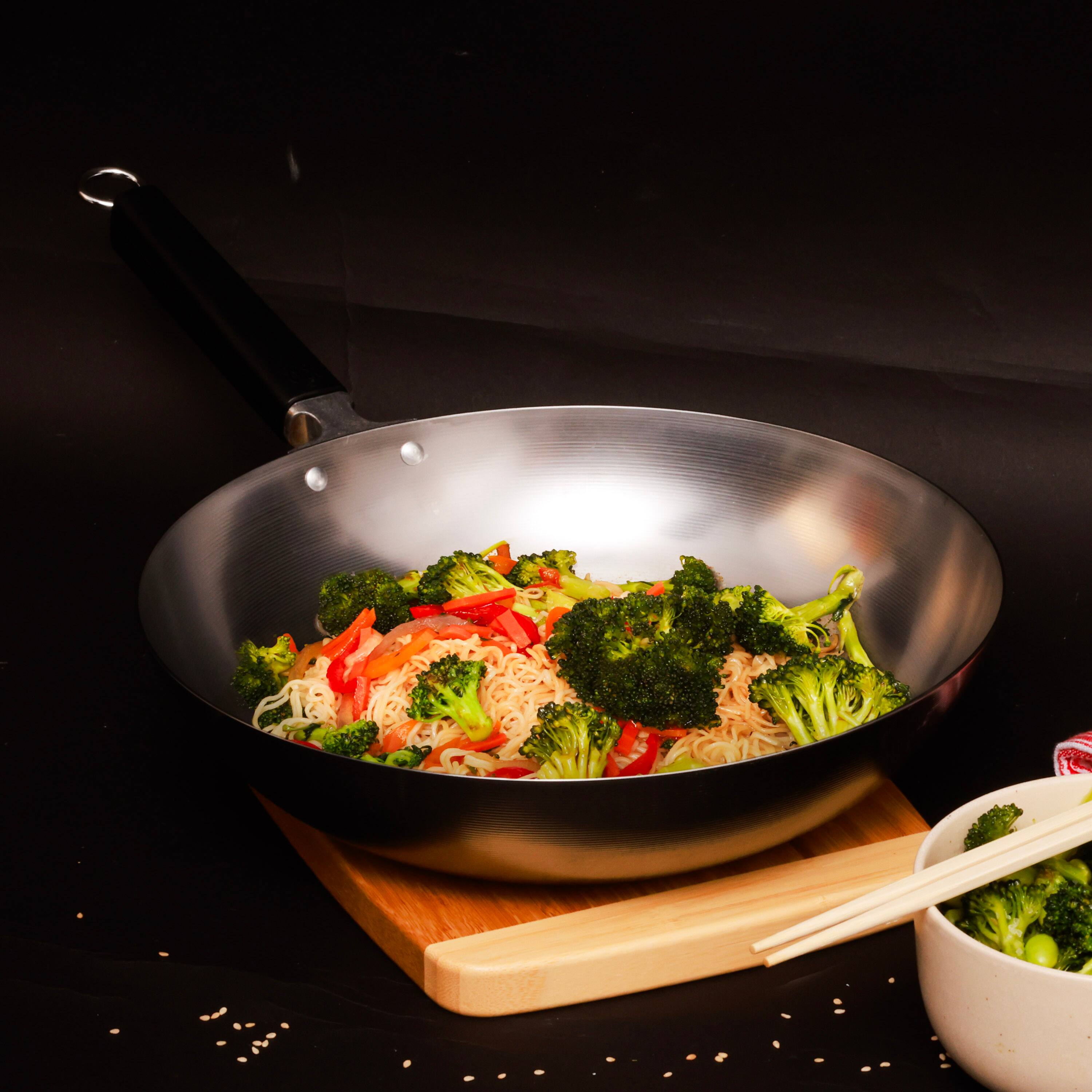 Alt View 4. Escali - Joyce Chen Professional Series 12-Inch Uncoated Carbon Steel Stir Fry Pan with Phenolic Handle - Silver.