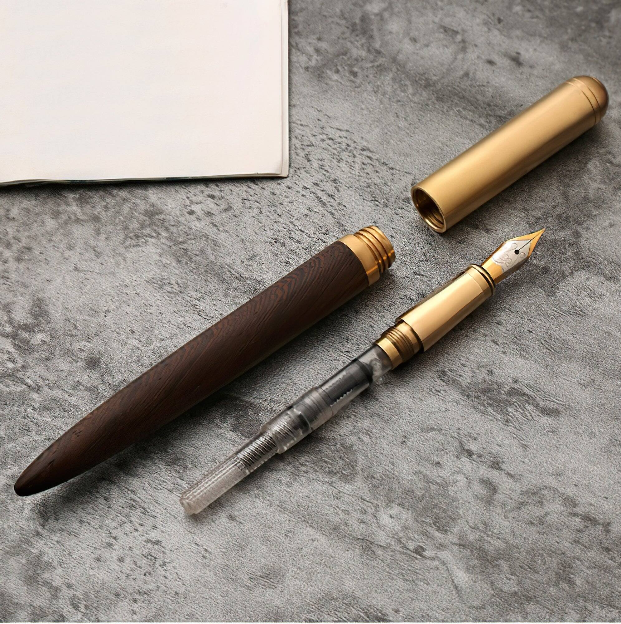 Left. Steel Horse Leather - The Hemmingway | Handmade Wood and Brass Fountain Pen - Black.