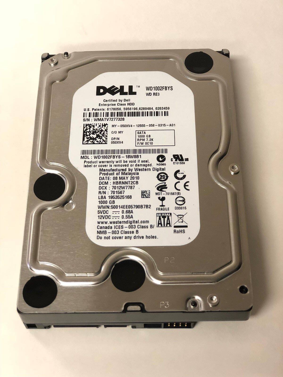 DELL WD1002FBYS WD RE3  
Certified by Dell Enterprise Class HDD  
U.S. Patents: 6178056, 5956196, 6289484, 6263459  
S/N: WMATV727328  
MY 050XV4 12555 058 - 0315 A01  
C/O MY  
DP/N 050XV4  
SATA 1000 CB  
RPM 7.2K  
F/W 0C10  
MDL WD1002FBYS  
I 18W8B1  
LR  
Product warranty will be void if seal, O uS 101569 is removed or damaged  
N3565 label or cover  
Manufactured by Western Digital  
Product of Malaysia  
DATE: 08 MAY 2010  
DCM: HBRNNT2CB  
DCX: 7012W7787  
R/N: 701567  
WDT-