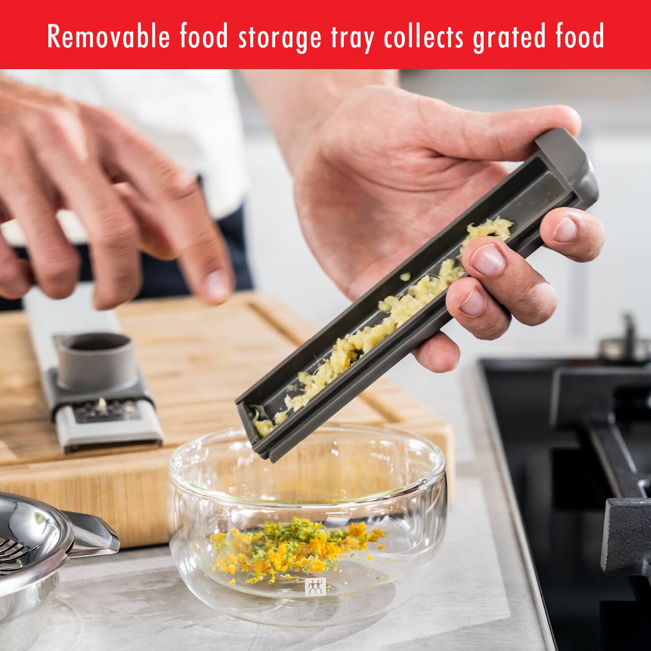Removable food storage tray collects grated food