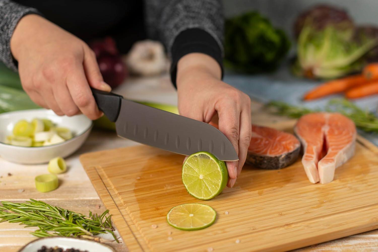 Alt View 1. Kuhn Rikon - ICED Santoku Knife 6.3-Inch, Ice Hardened German Stainless Blade - Black.