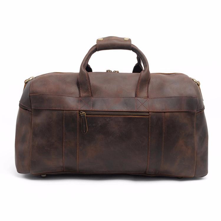Angle. Steel Horse Leather - The Asta Weekender | Handcrafted Leather Duffle Bag - Dark Brown.