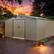 Left. Mondawe - 10x12 FT Outdoor Storage Shed with Color Steel Plate and Two Daylight Windows - Brown.