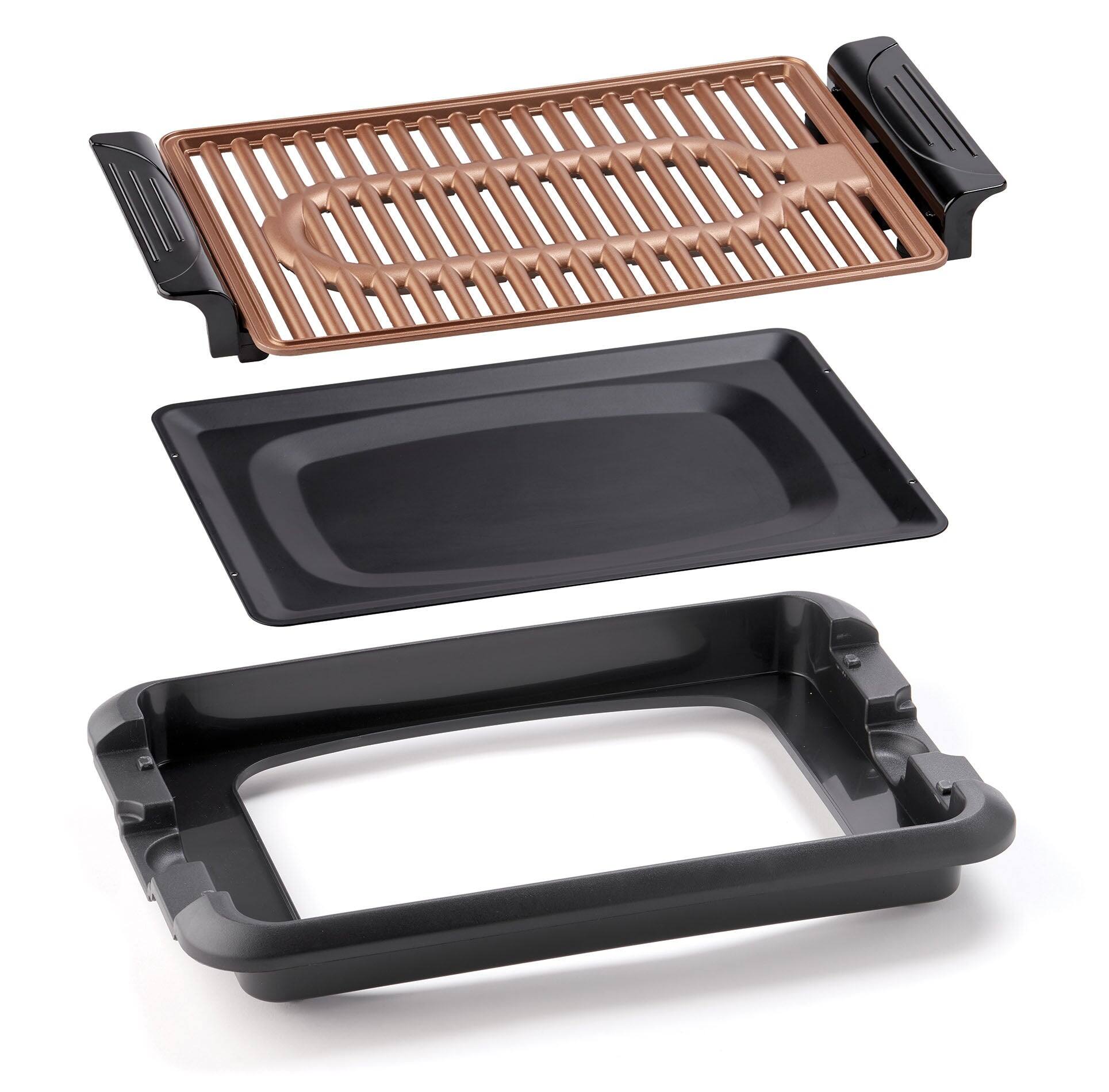 Left. Betty Crocker - Betty Crocker Indoor Smokeless Grill, 10 x 15 inch Copper Coated Nonstick Cooking Surface - Black.