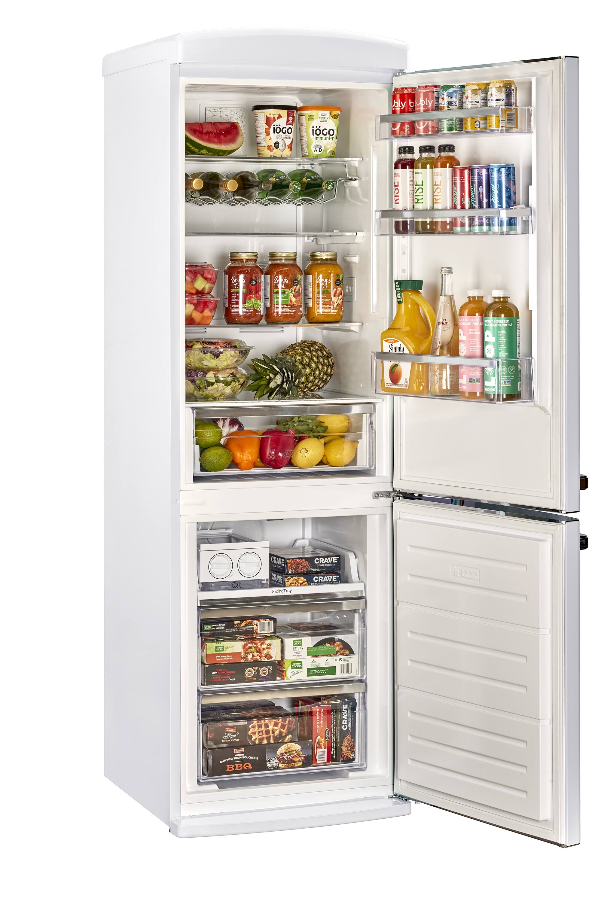 The refrigerator is filled with various food items and drinks. The shelves contain fruits such as apples and oranges, as well as vegetables like broccoli. There are also multiple bottles of drinks, including soda, juice, and water. The refrigerator is well-stocked and ready for use.