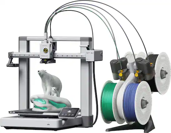 The image features a 3D printer with a white polar bear figurine on top of it. The printer is surrounded by multiple spools of green and white filament, which are used to create the 3D printed objects. The printer is equipped with a touch screen, allowing for easy operation and control. The scene showcases the versatility and capabilities of the 3D printer, as it can create intricate and detailed objects like the polar bear figurine.