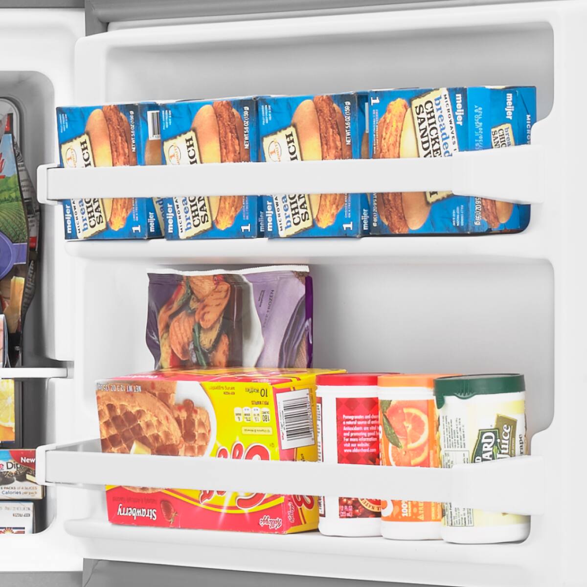 Sure, here is the corrected and grouped text from the image:

**Top Shelf:**
- Meijer
- MICROWAVE
- CHICKEN
- SANDWICH
- 1
- NET WT 560Z (150g)

**Middle Shelf:**
- Meijer
- MICROWAVE
- CHICKEN
- SANDWICH
- 1
- NET WT 560Z (150g)

**Bottom Shelf:**
- Meijer
- MICROWAVE
- CHICKEN
- SANDWICH
- 1
- NET WT 560Z (150g)

**Other Items:**
- New
- Dole
- Pineapple
- 100% Juice
- 100% Juice
- 100% Juice
- 100% Juice
- 100% Juice
- 100% Juice
- 100% Juice
- 100% Juice
- 100% Juice
- 100% Juice
- 100% Juice
- 100% Juice
- 